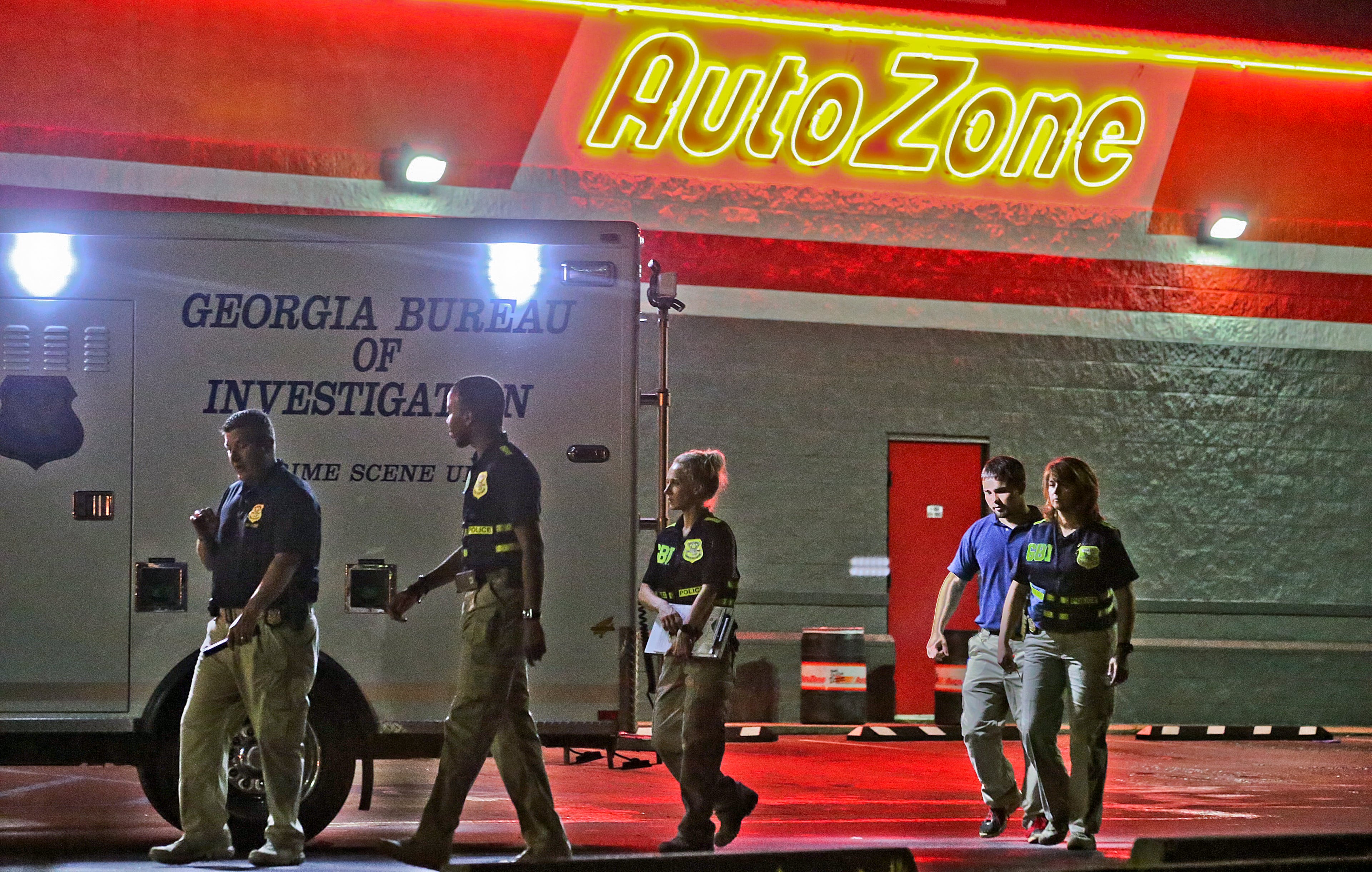 The station reported that someone called Chamblee police just before midnight and said five employees were tied up inside the store. When officers arrived, the suspect tried to run from the store, and as officers tried to arrest him, he pulled out a gun. JOHN SPINK/JSPINK@AJC.COM