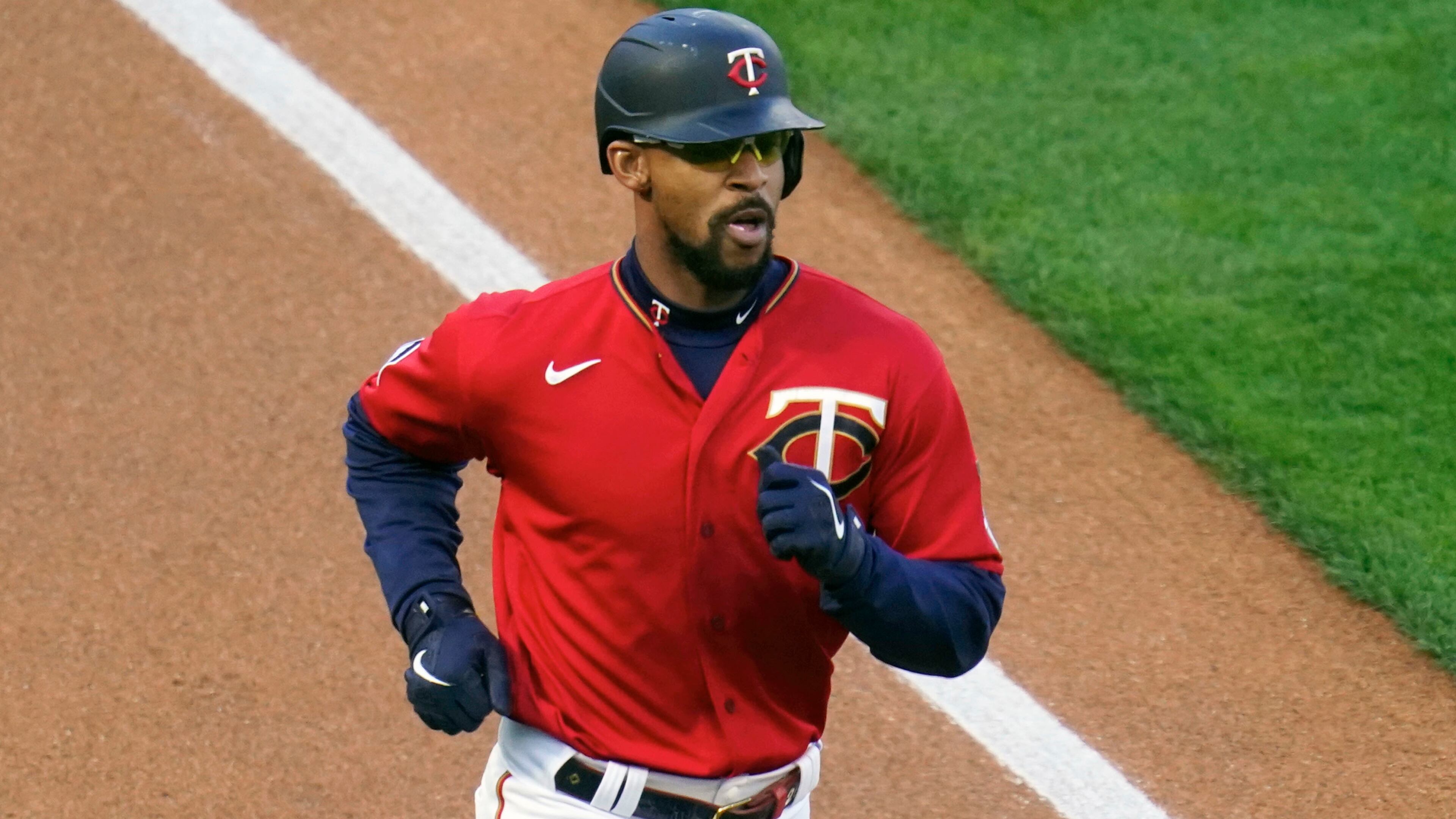 Minnesota Twins' Byron Buxton races home to score against the Texas Rangers, Tuesday, May 4, 2021, in Minneapolis. (Jim Mone/AP)