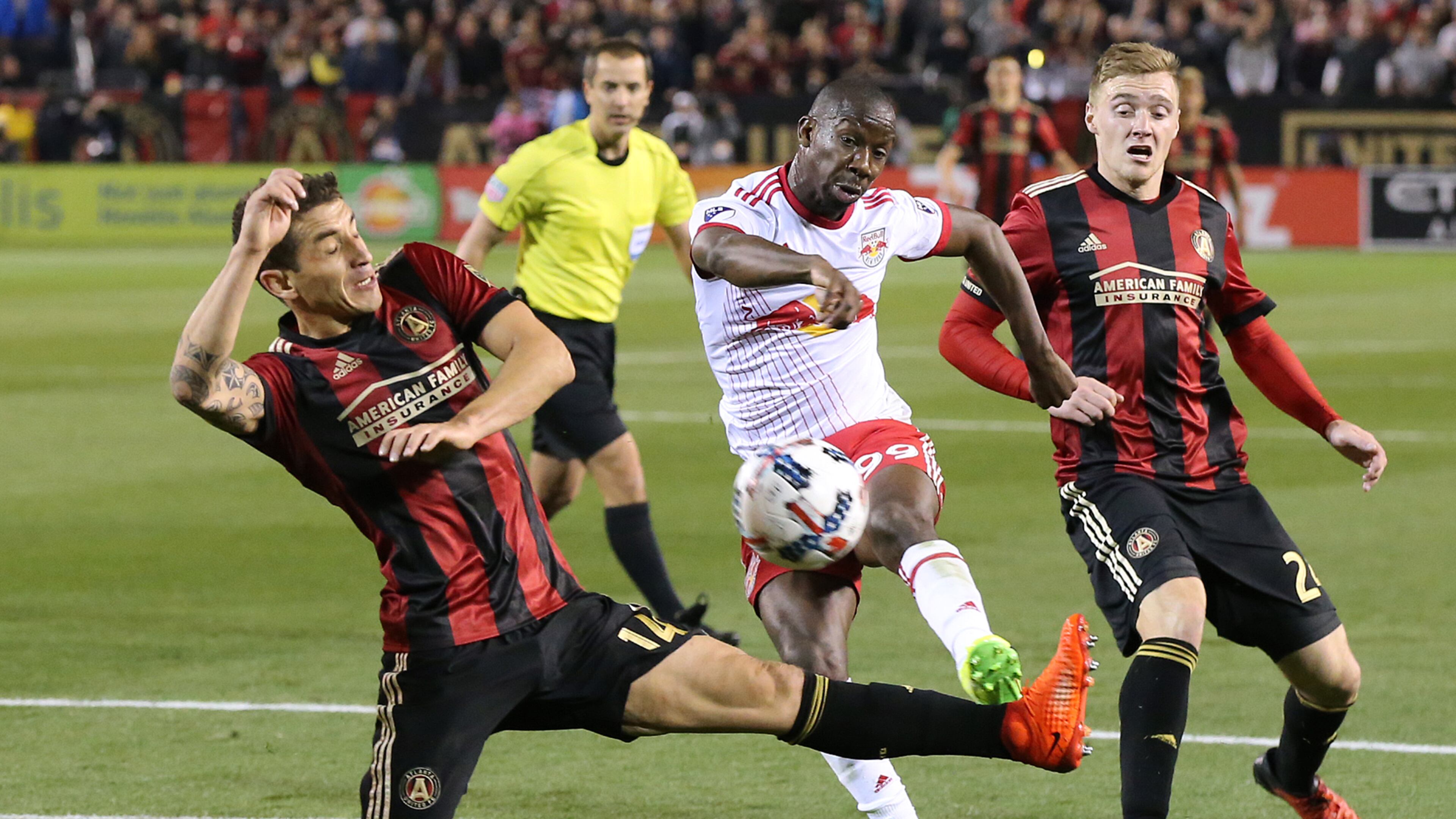 March 5, 2017, Atlanta: Atlanta United RC Carlos Carmona canât block a shot by N.Y. Red Bulls Bradley Wright-Phillips during the second half in the first game in franchise history on Sunday, March 5, 2017, in Atlanta. Wright-Phillips scored the winning goal to defeat the Atlanta United RC 2-1. Curtis Compton/ccompton@ajc.com