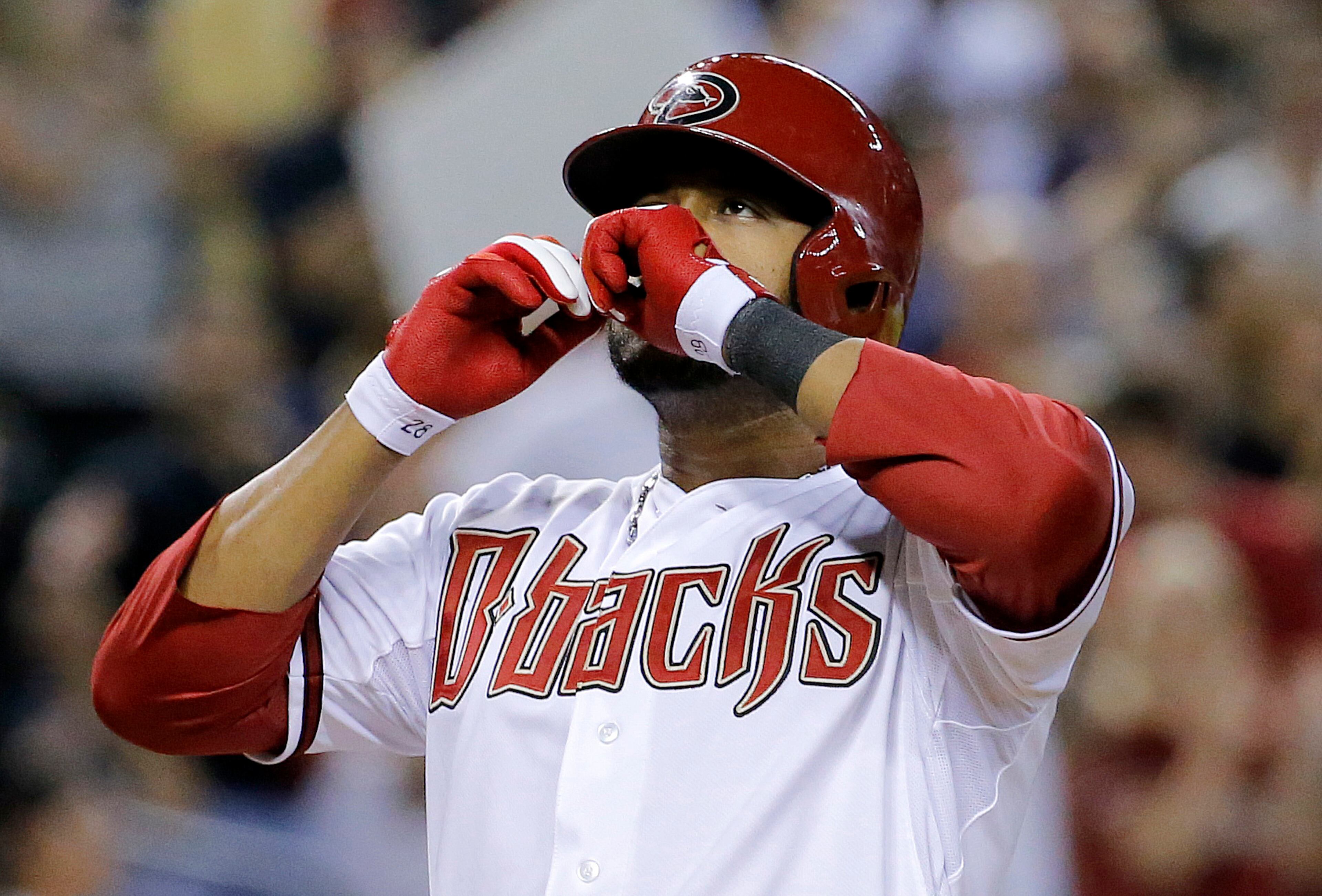 In this Thursday, July 31, 2014, file photo, Arizona Diamondbacks' Andy Marte celebrates his two run home run against the Pittsburgh Pirates during the sixth inning of a baseball game in Phoenix. Authorities in the Dominican Republic said, Sunday, Jan. 22, 2017, that Kansas City Royals pitcher Yordano Ventura and former major leaguer Marte both have died in separate traffic accidents. (AP Photo/Matt York, File)