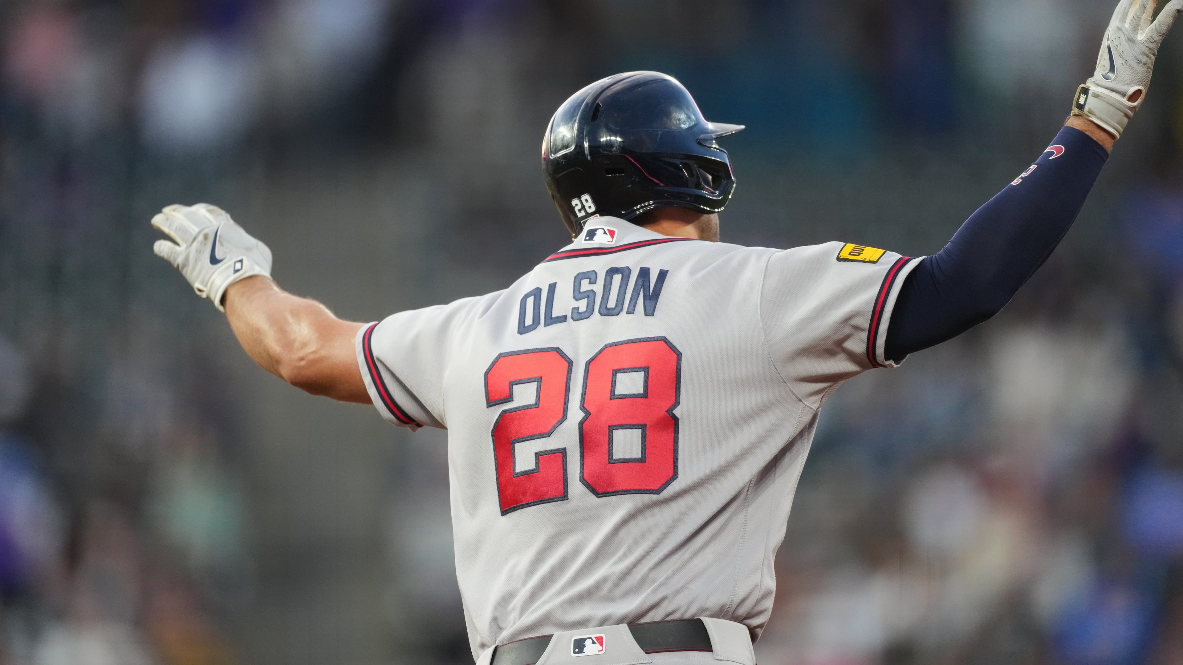 Atlanta Braves' Matt Olson gestures to the bullpen as he circles the bases after hitting a solo home run off Colorado Rockies starting pitcher Jose Quintana in the fourth inning of a baseball game Friday, May 1, 2026, in Denver. (AP Photo/David Zalubowski)