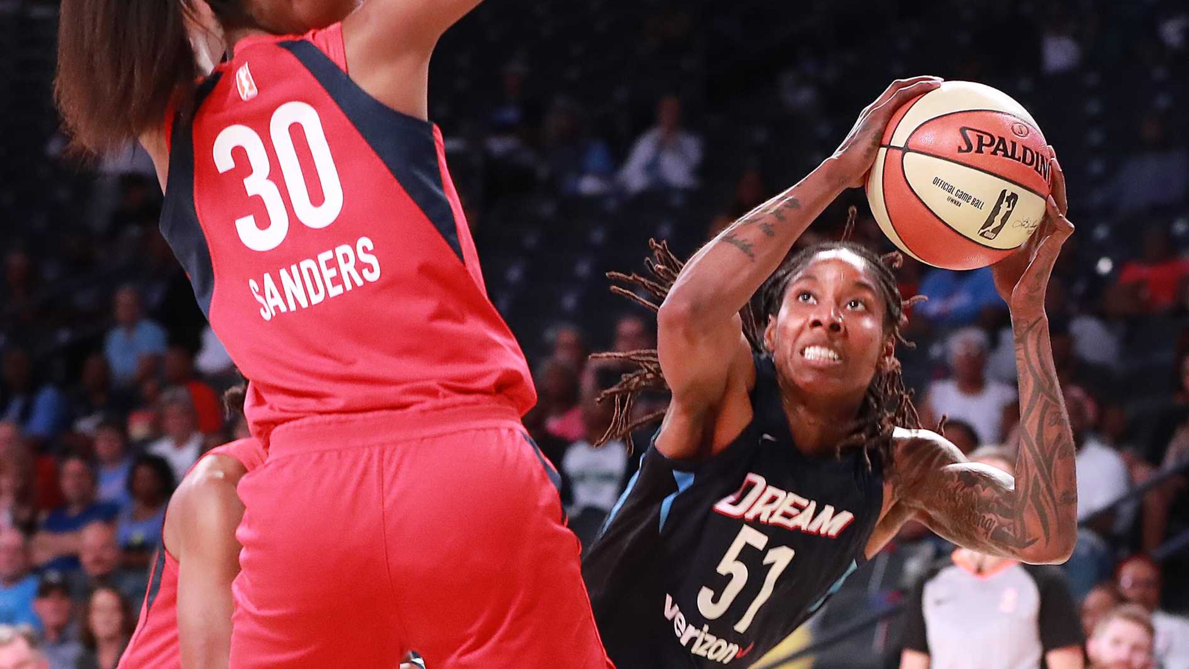 Atlanta Dream forward Jessica Breland (middle) had a double-double Wednesday. AJC file photo