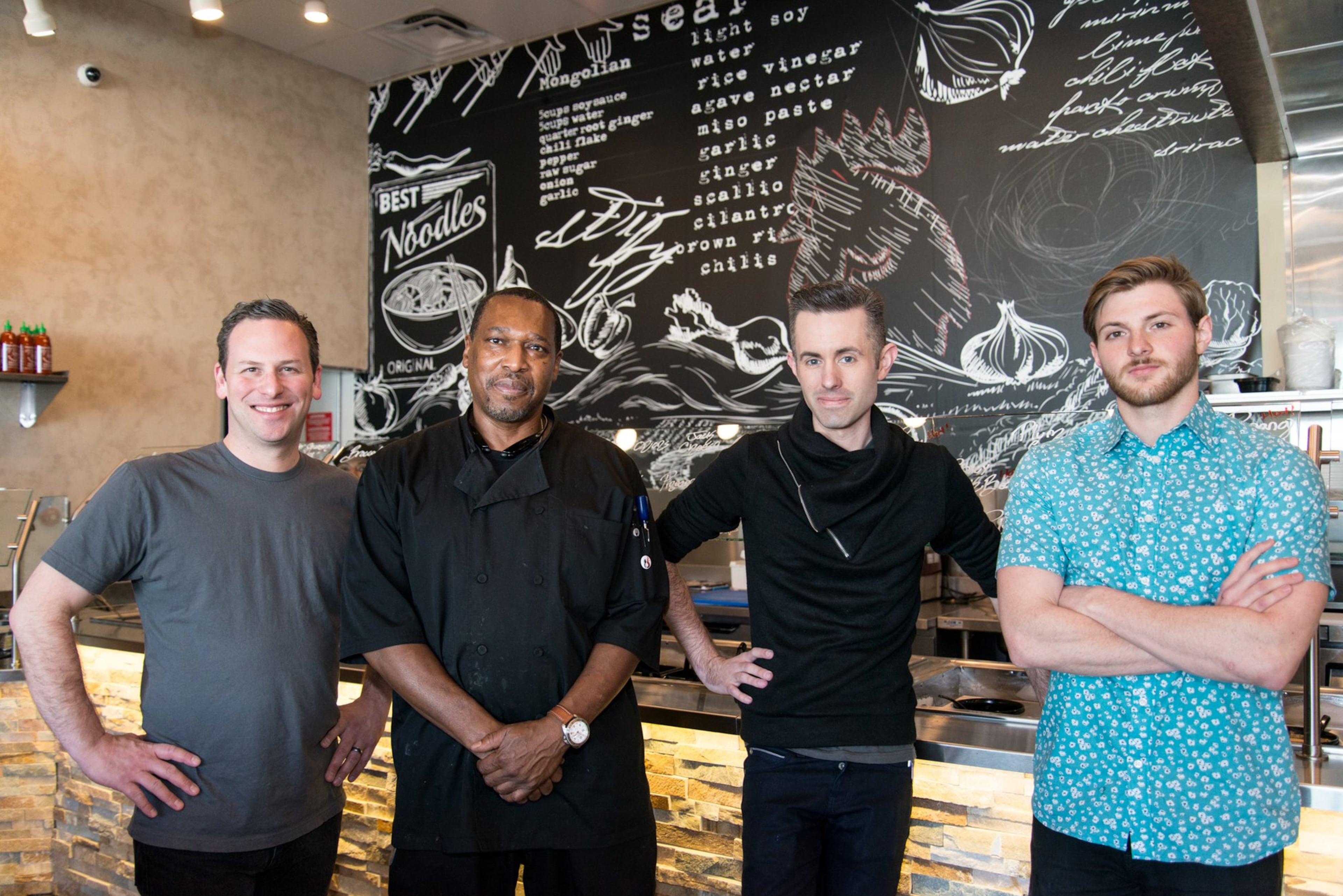 One Rooster Mongolian Bar team (from left to right) co-owner Mike Blum, chef Alvin Reed, co-owner Nicholas Brown, and beverage director Caleb Brown. Photo credit - Mia Yakel.