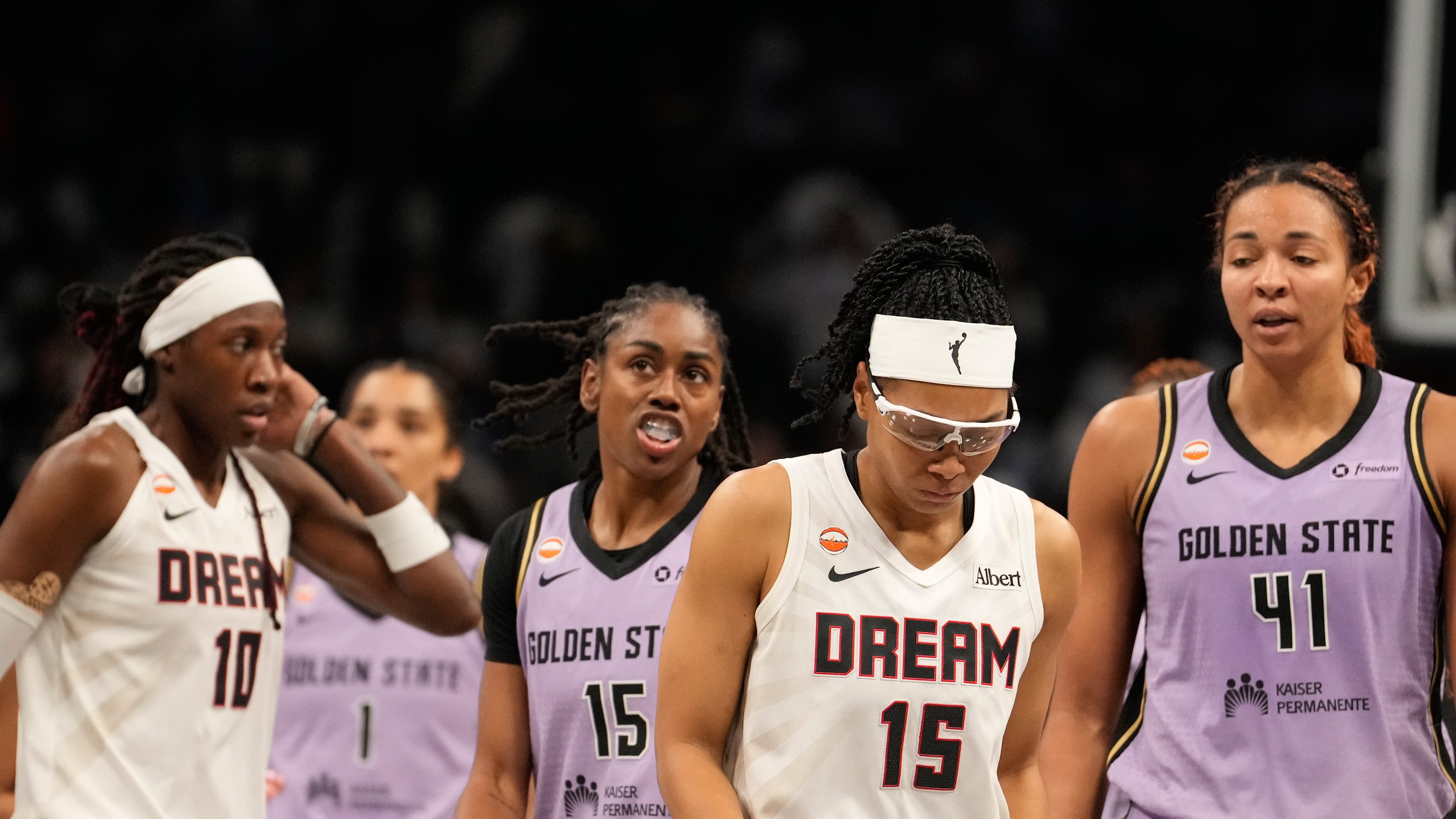 Atlanta Dream guard Allisha Gray (center) walks off the court near the end of Game 4 of the WNBA basketball finals against the Golden State Valkyries on Saturday, Oct. 24, 2026, in Atlanta. (Brynn Anderson/AP)