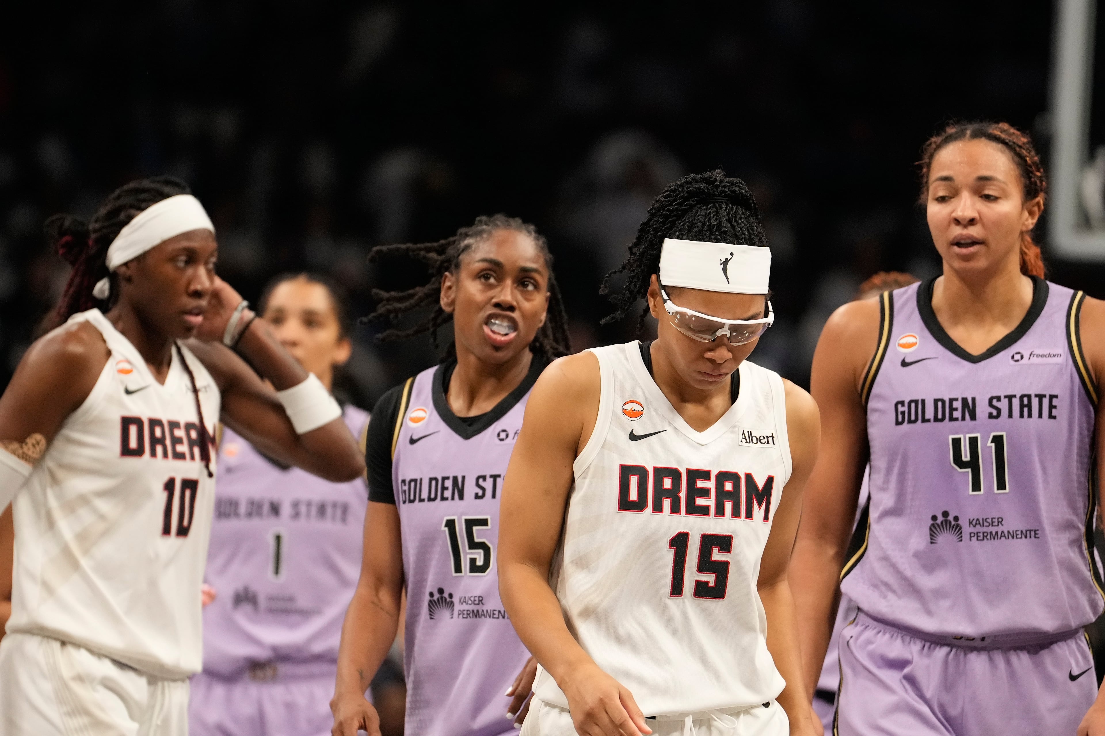 Atlanta Dream guard Allisha Gray (center) walks off the court near the end of Game 4 of the WNBA basketball finals against the Golden State Valkyries on Saturday, Oct. 24, 2026, in Atlanta. (Brynn Anderson/AP)