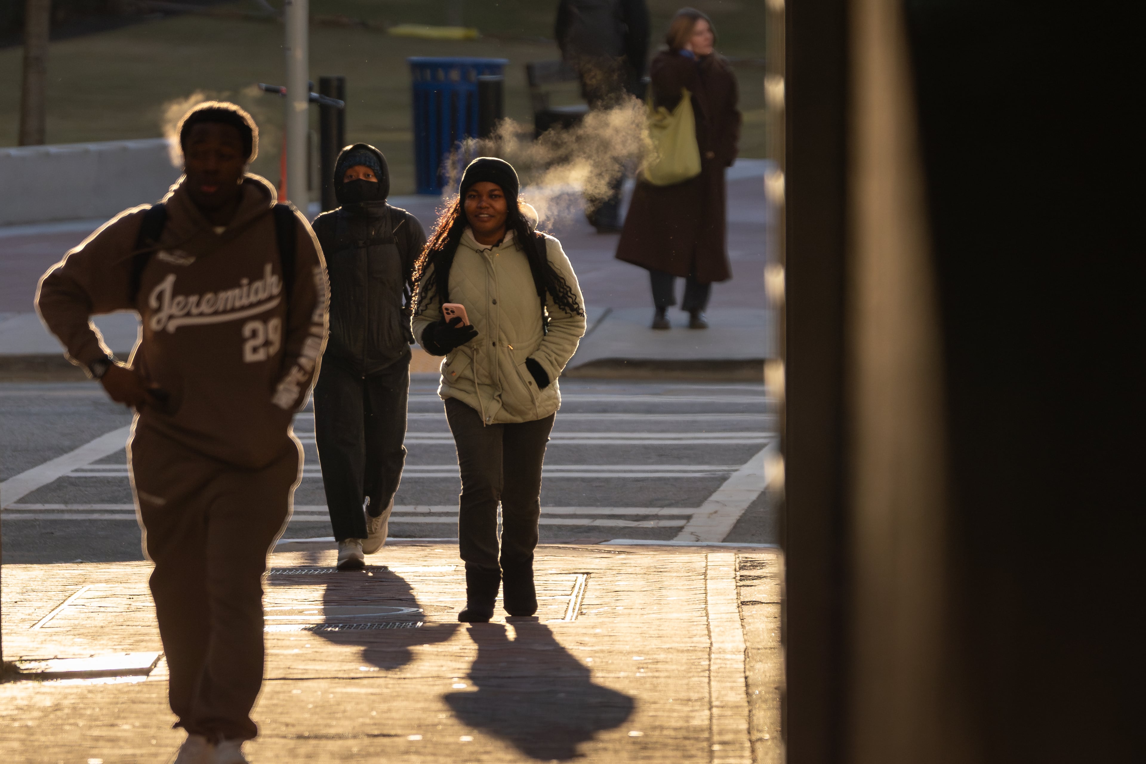 Georgia State University students walk to class in sub-freezing morning temperatures Tuesday. This weekend is expected to be very cold in metro Atlanta. (Ben Hendren for the AJC)
