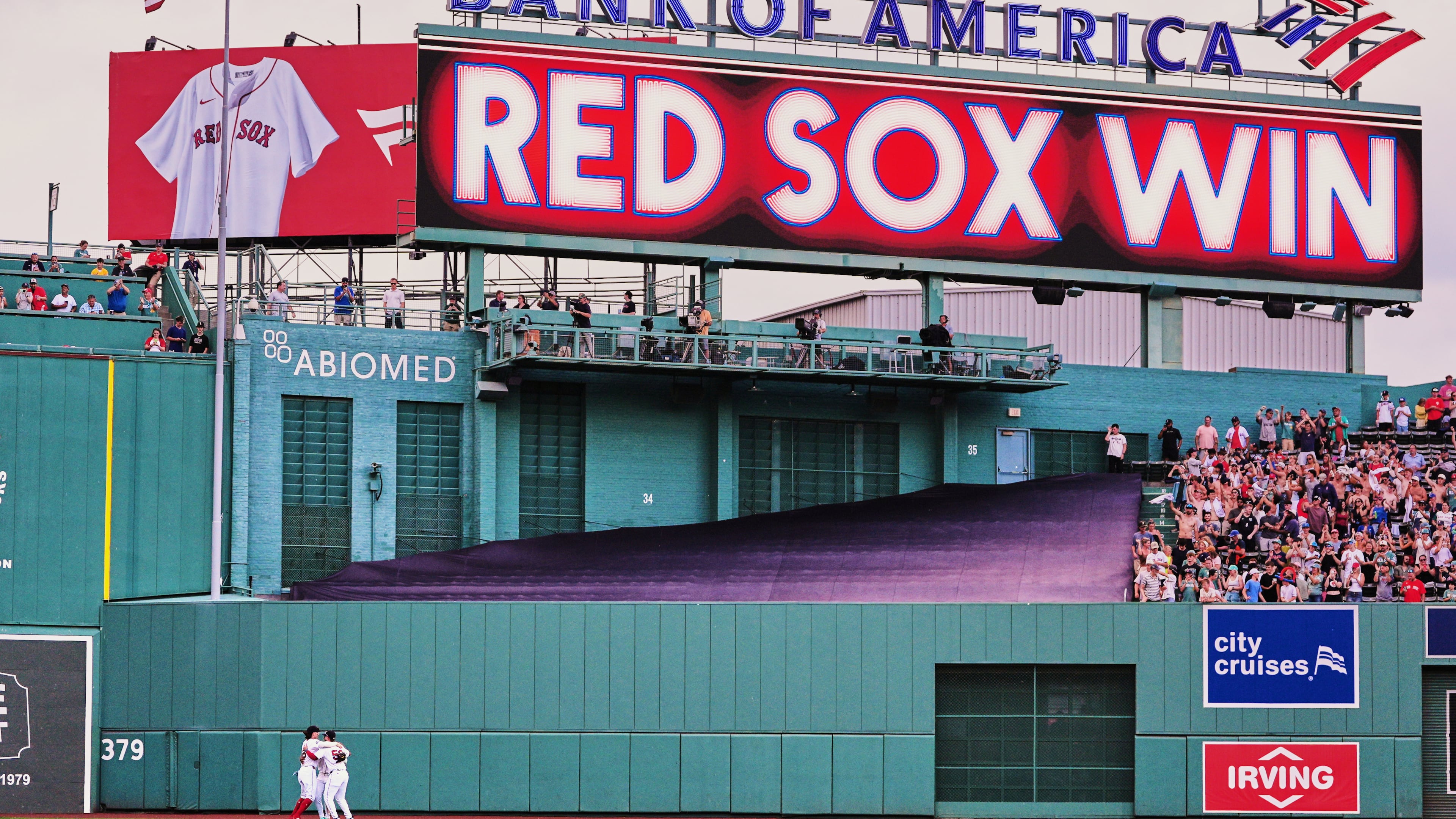 Boston Red Sox outfielders celebrate after defeating the Baltimore Orioles in the first baseball game of a doubleheader, Wednesday, July 22, 2026, in Boston. (AP Photo/Charles Krupa)