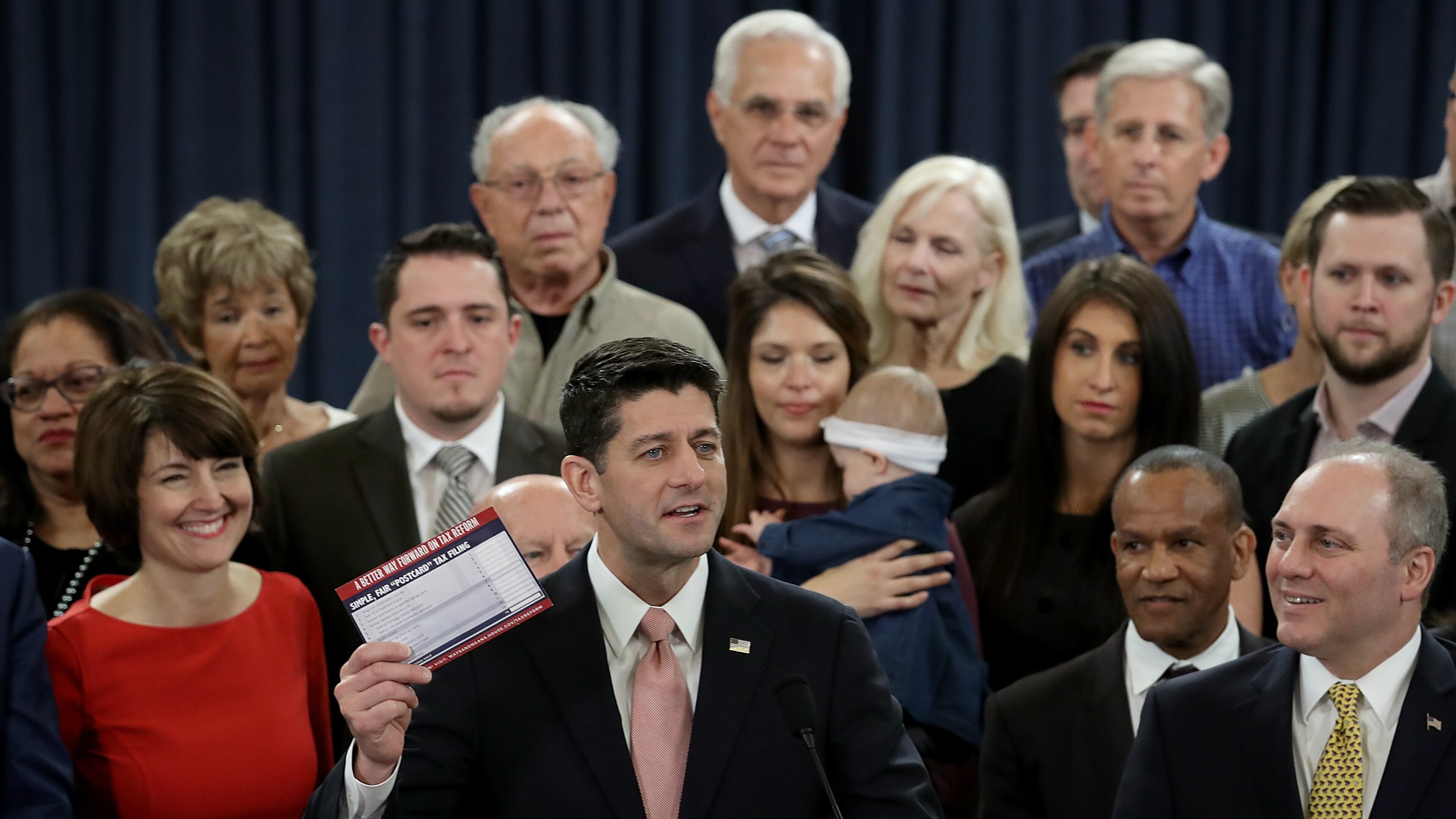 WASHINGTON, DC - NOVEMBER 02: Speaker of the House Paul Ryan (R-WI), surrounded by American families, and members of the House Republican leadership introduces tax reform legislation November 2, 2017 in Washington, DC. The tax reform legislation is a centerpiece of U.S. President Donald Trump's legislative agenda. (Photo by Win McNamee/Getty Images)