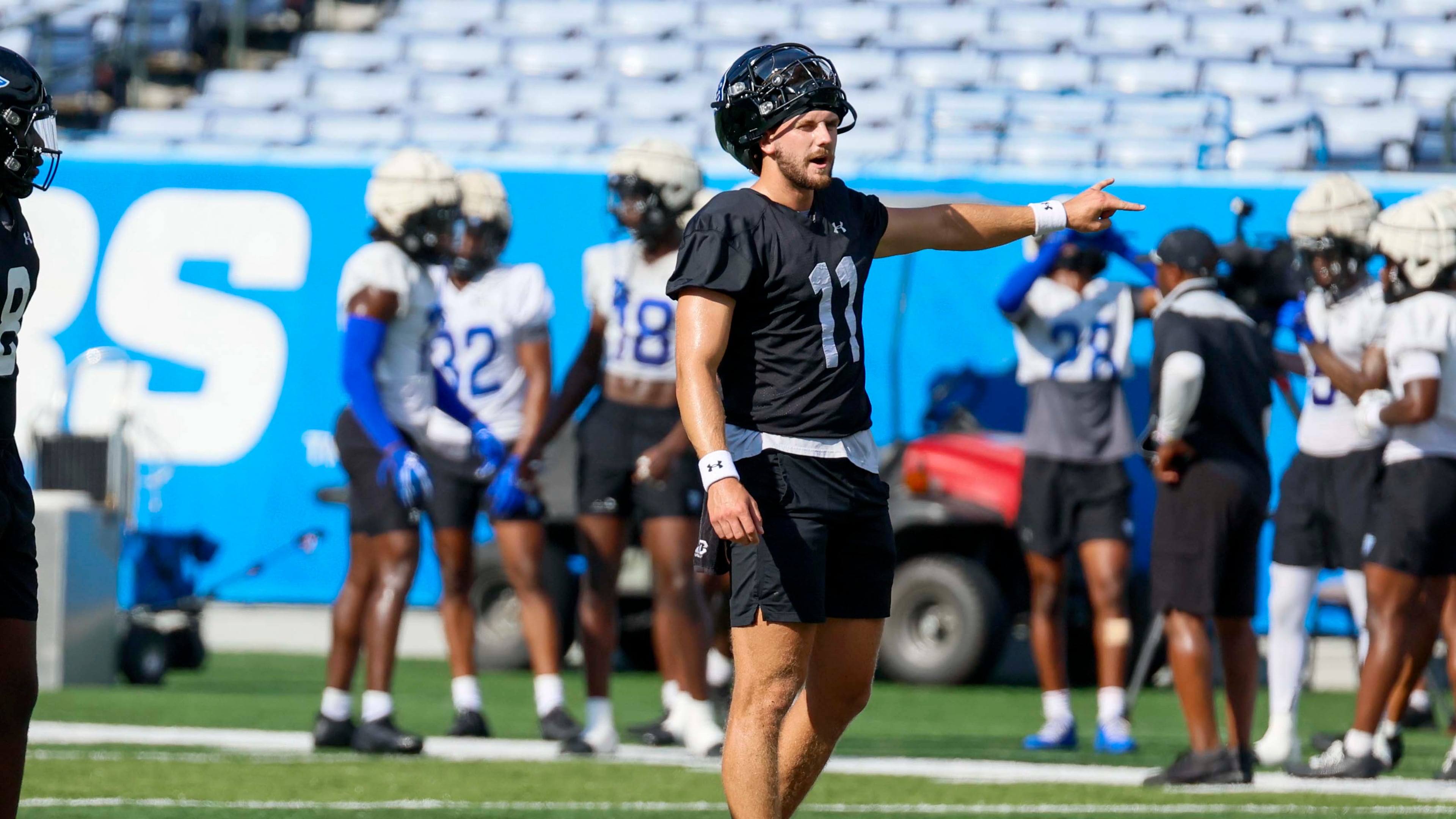 GSU quarterback Christian Veilleux signals to teammates during Georgia State University’s first day of practice at Center Parc Stadium on Thursday, July 31, 2025, Atlanta.
(Miguel Martinez/AJC)