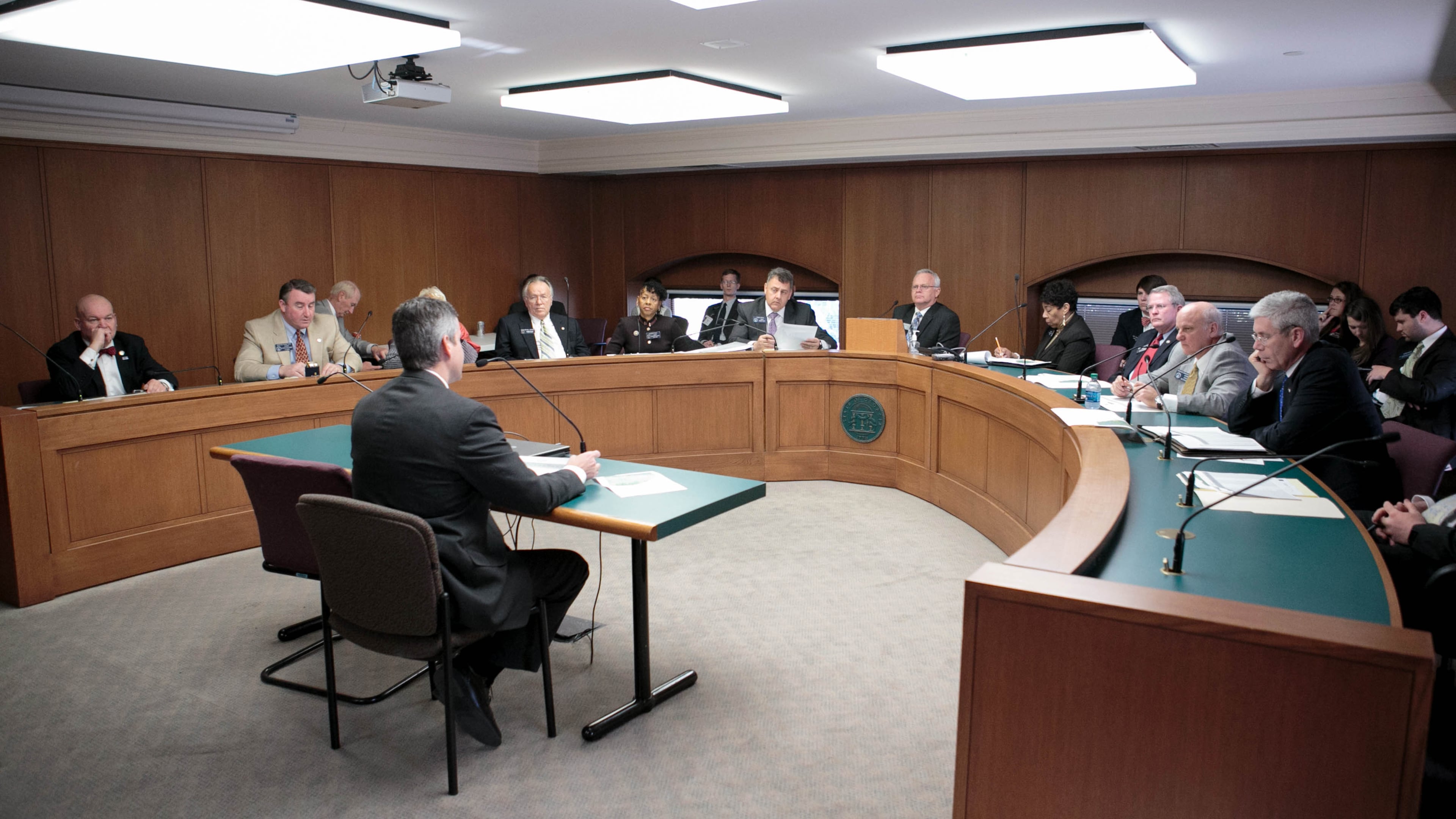 February 2, 2015 - Atlanta, Ga: The Senate Transportation Committee talks with Clint Mueller, left, the Legislative Director of the Association County Commissioners of Georgia, during the 9th legislative day at the Georgia State Capitol Monday afternoon in Atlanta, Ga., February 2, 2015. PHOTO / JASON GETZ The Senate Transportation Committee talks with Clint Mueller, left, the legislative director of the Association County Commissioners of Georgia on Monday. AJC/Jason Getz