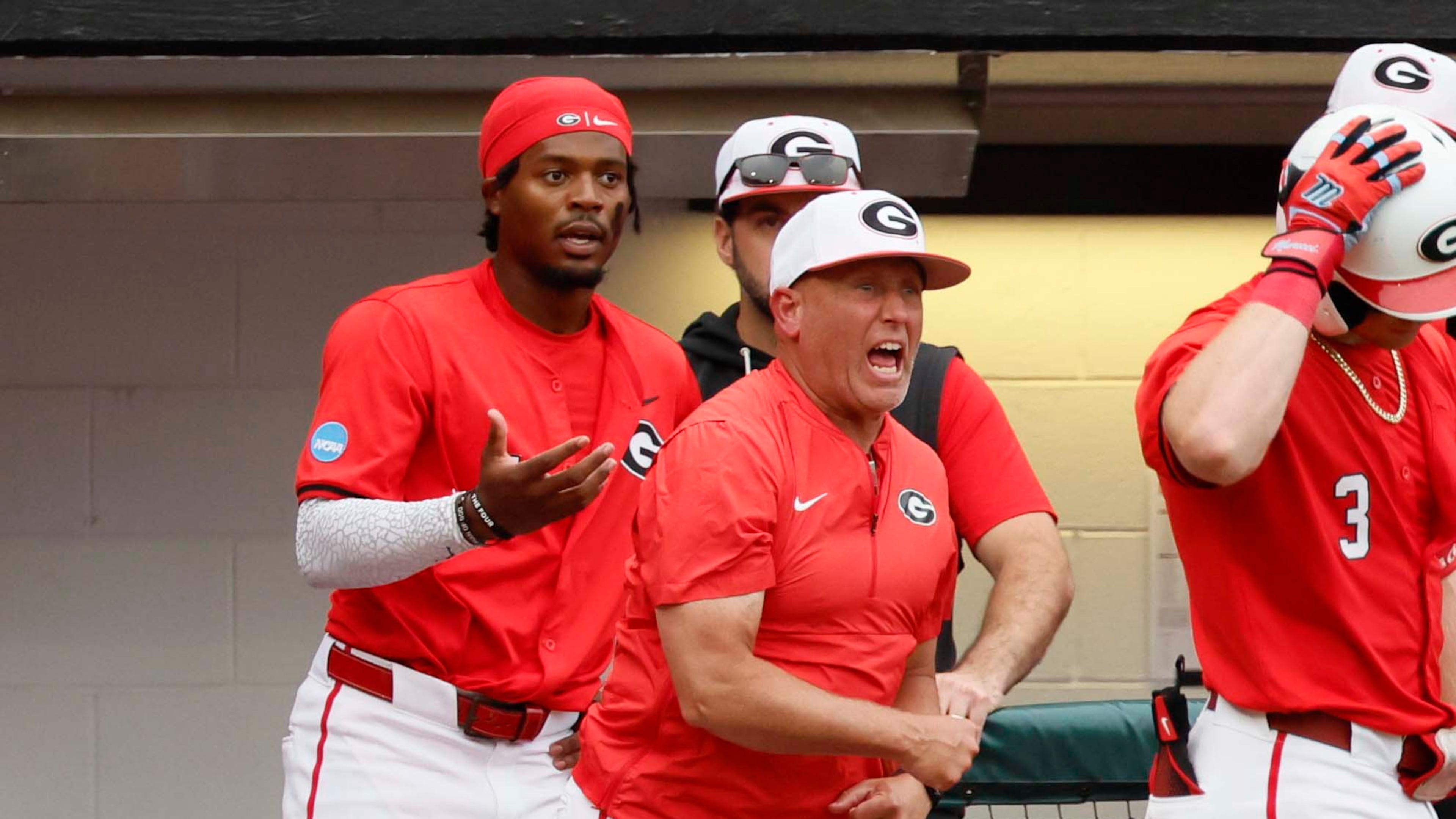 Georgia Bulldogs head coach Wes Johnson leaves the dugout after infielder Tre Phelps was ejected for excessive celebration during the NCAA Regional final at Foley Field on Sunday, May 31, 2026. Johnson was also ejected. (Miguel Martinez/AJC)