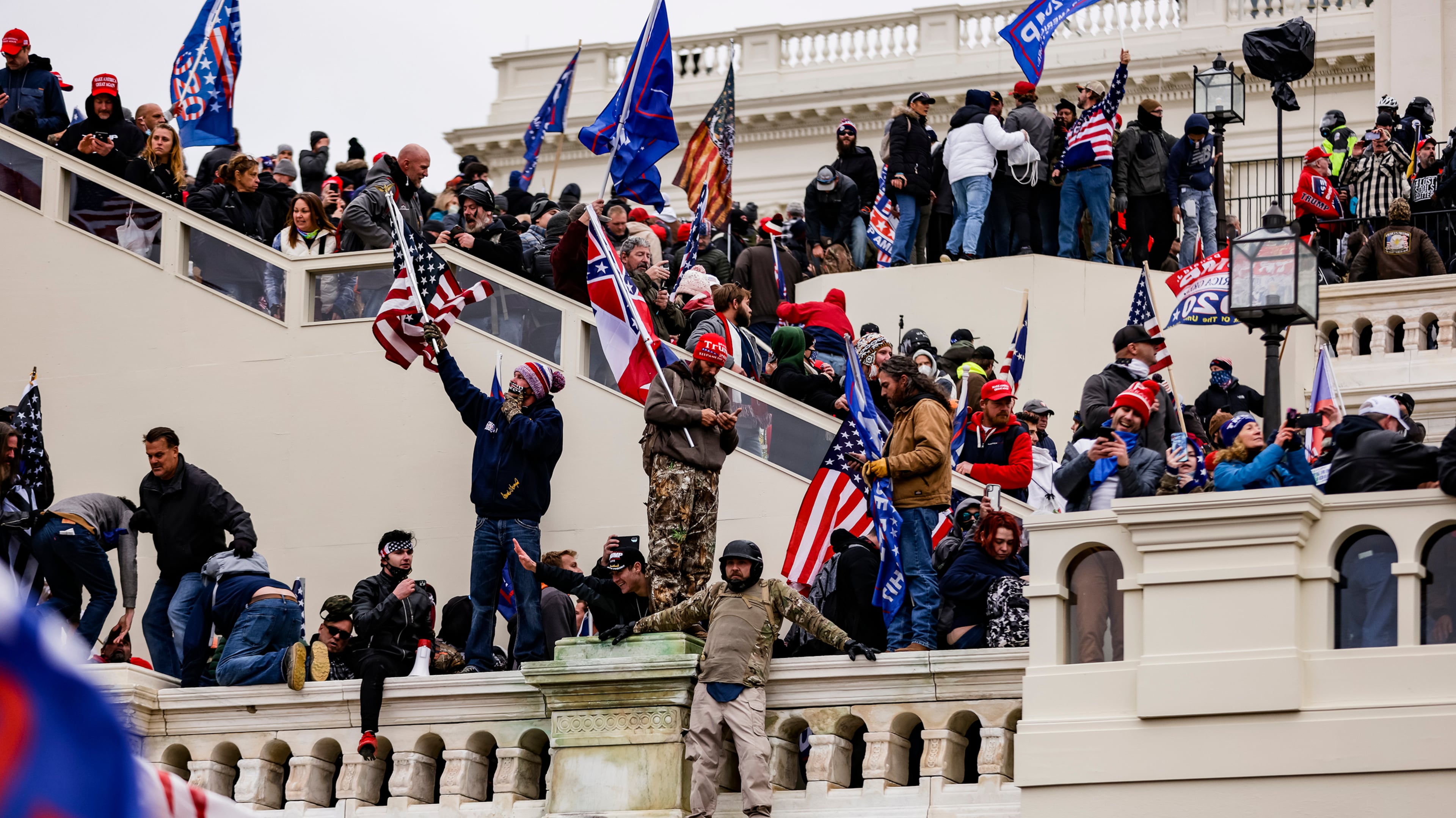 A pro-Donald Trump mob storms the U.S. Capitol following a rally with the then-president on Jan. 6 in Washington. (Samuel Corum/Getty Images/TNS)