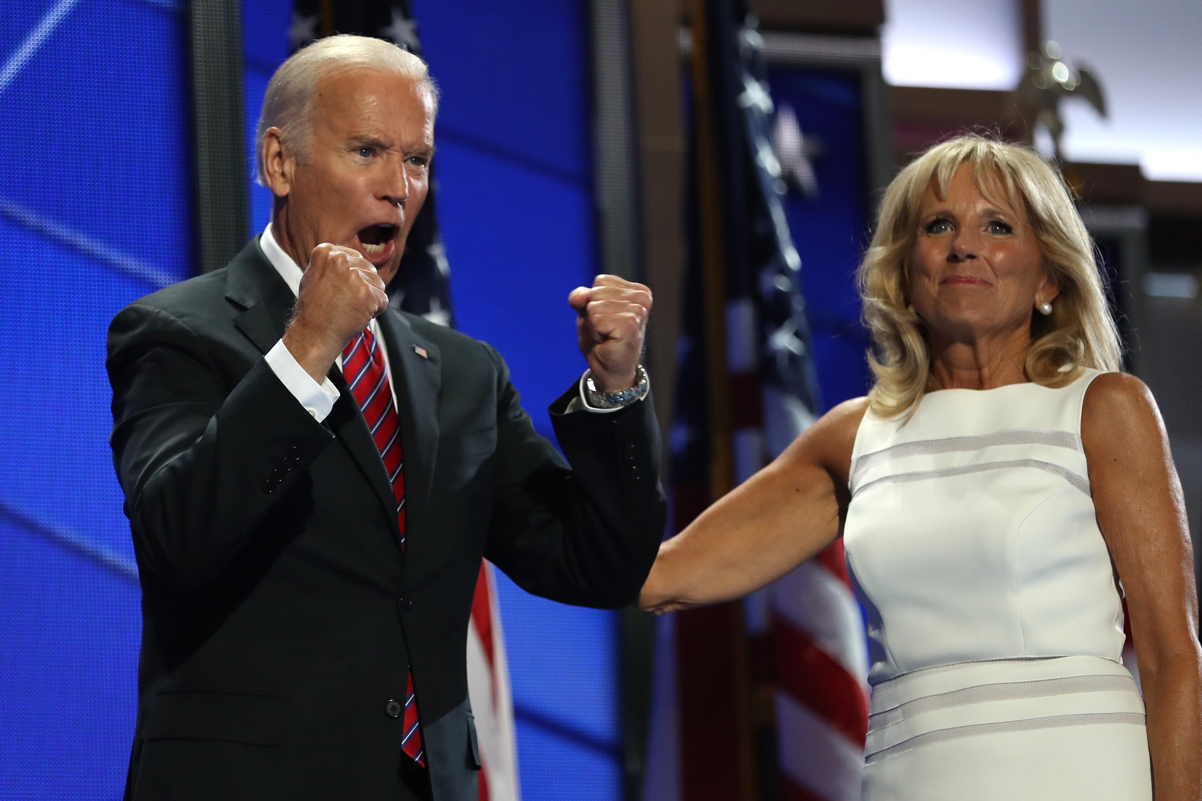 U.S. Vice President Joe Biden reacts to the crowd as his wife, Jill Biden, looks on after delivering remarks on the third day of the Democratic National Convention at the Wells Fargo Center, July 27, 2016 in Philadelphia. (Photo by Joe Raedle/Getty Images)