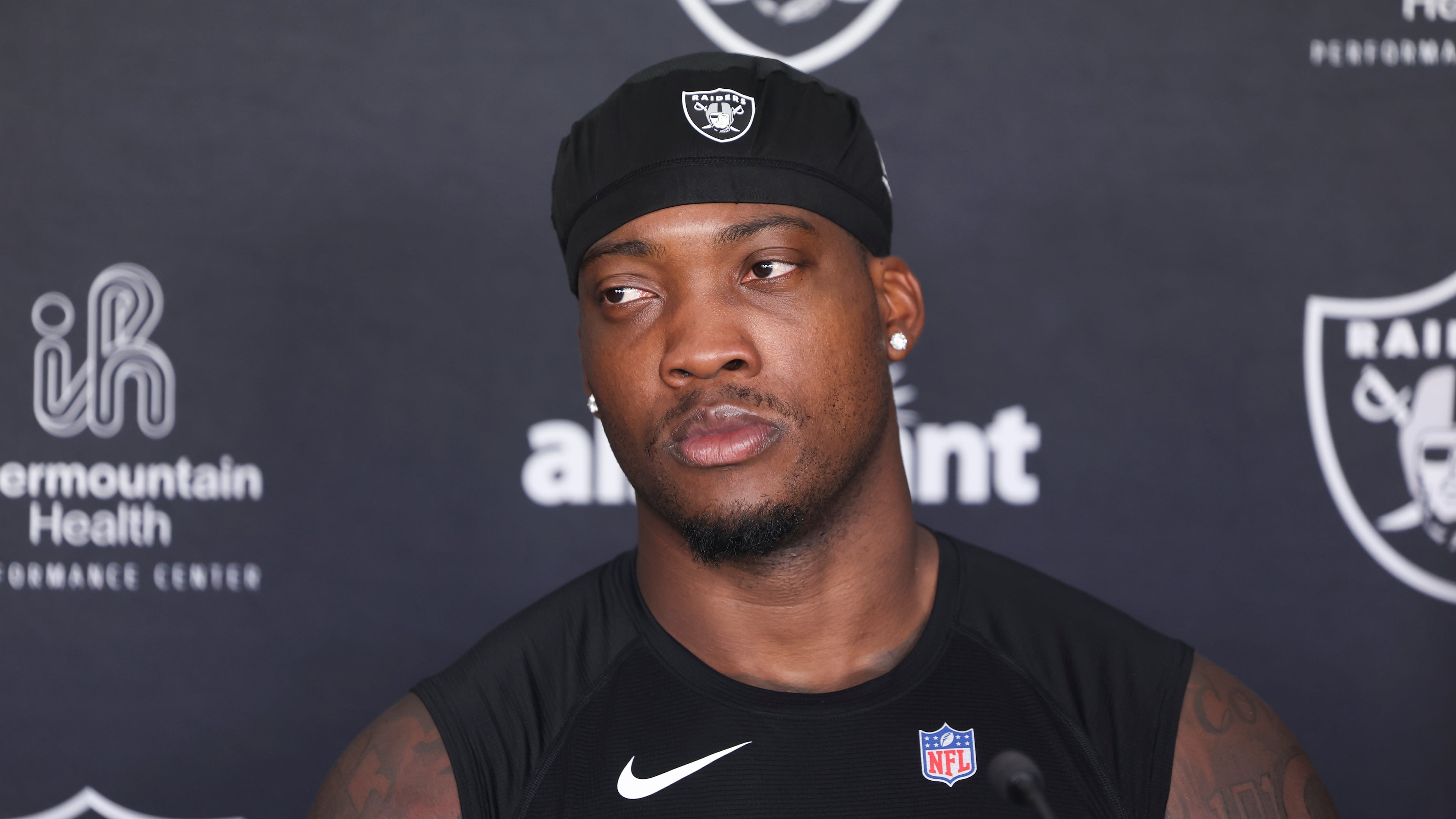 Las Vegas Raiders linebacker Quay Walker (7) speaks during a news conference at the team's NFL football training camp, Thursday, July 30, 2026, in Henderson, Nev. (AP Photo/Ian Maule)