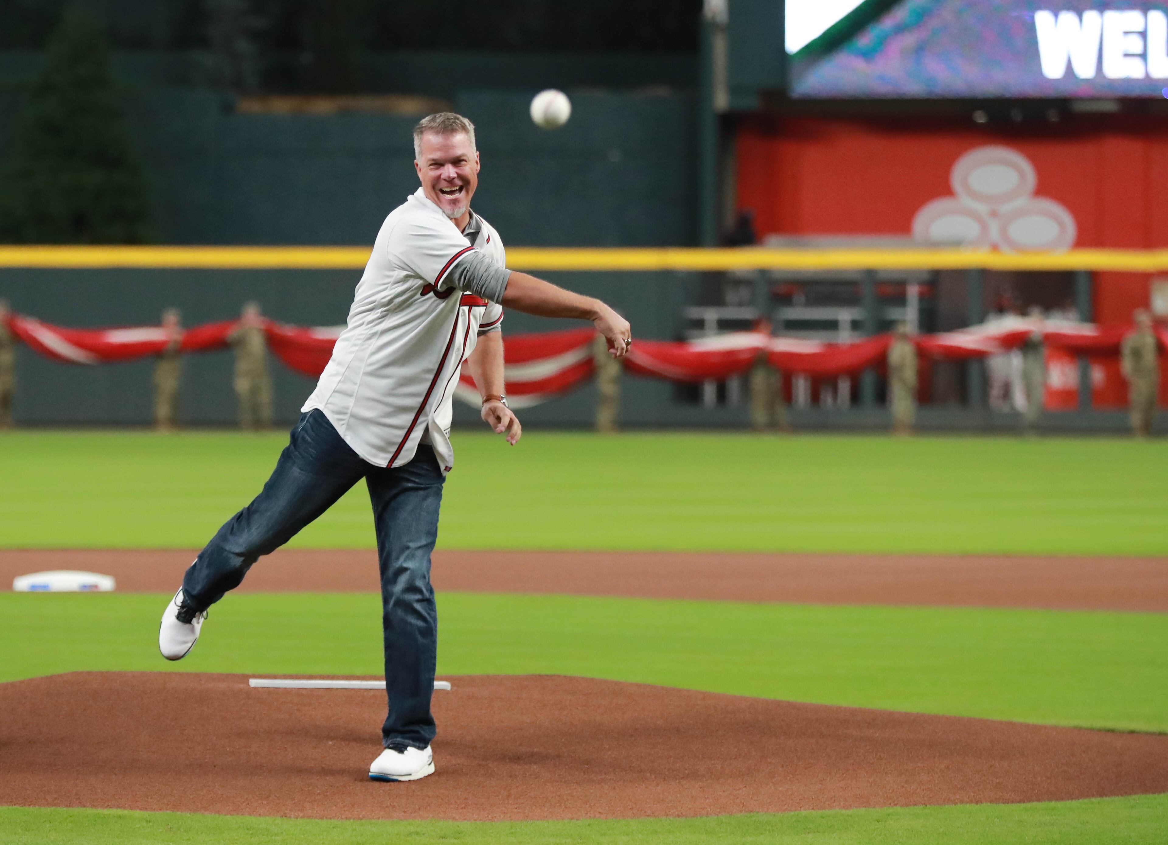 Former Atlanta Braves third baseman Chipper Jones throws out the first pitch before the start of their game against the Los Angeles Dodgers in Game 3 of a National League Division Series baseball game Sunday, October 7, 2018, in Atlanta. Curtis Compton/ccompton@ajc.com
