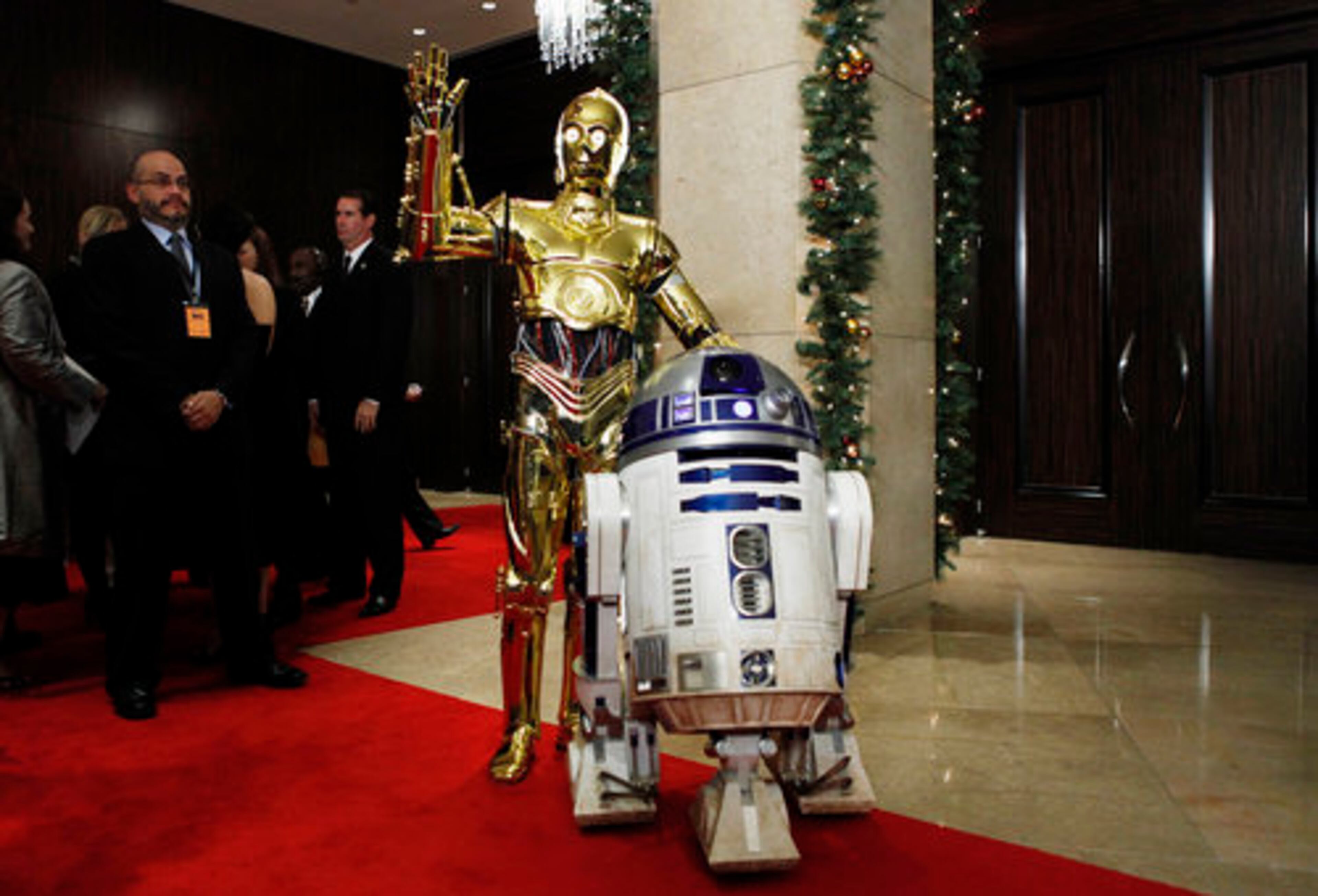 "Star Wars" characters C-3PO (left) and R2D2 arrive at the 23rd annual award presentation.
