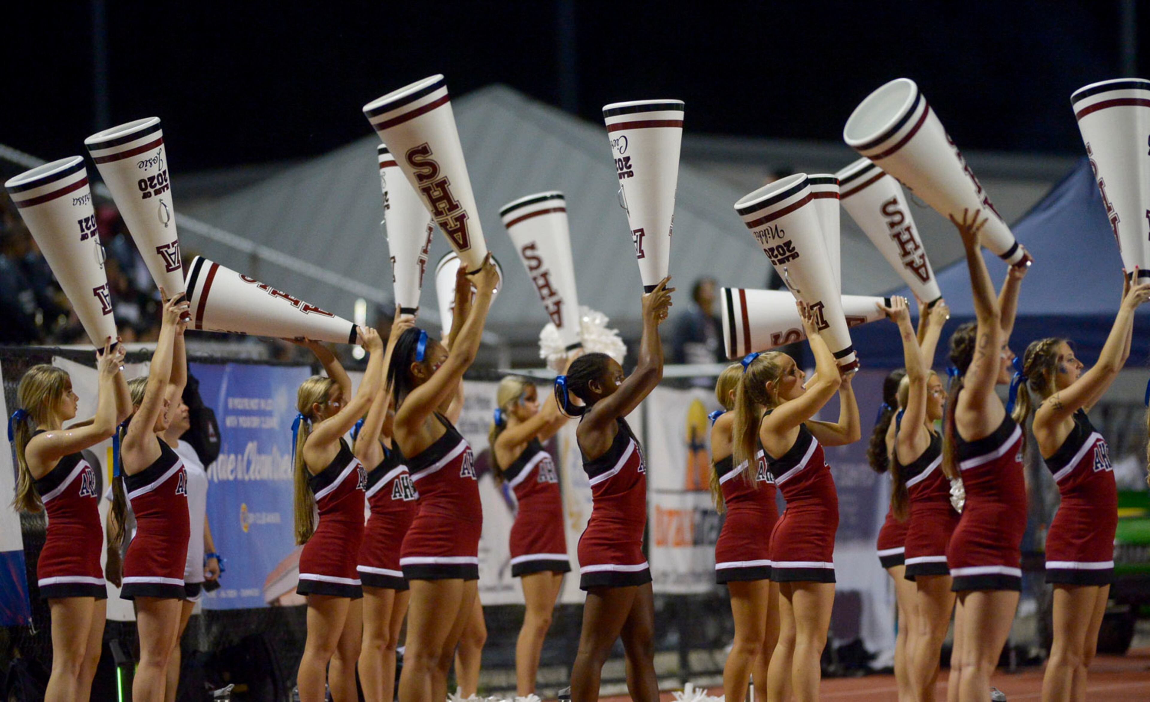 Alpharetta cheerleaders perform during the first half of Friday's game at Centennial. (Daniel Varnado/Special)