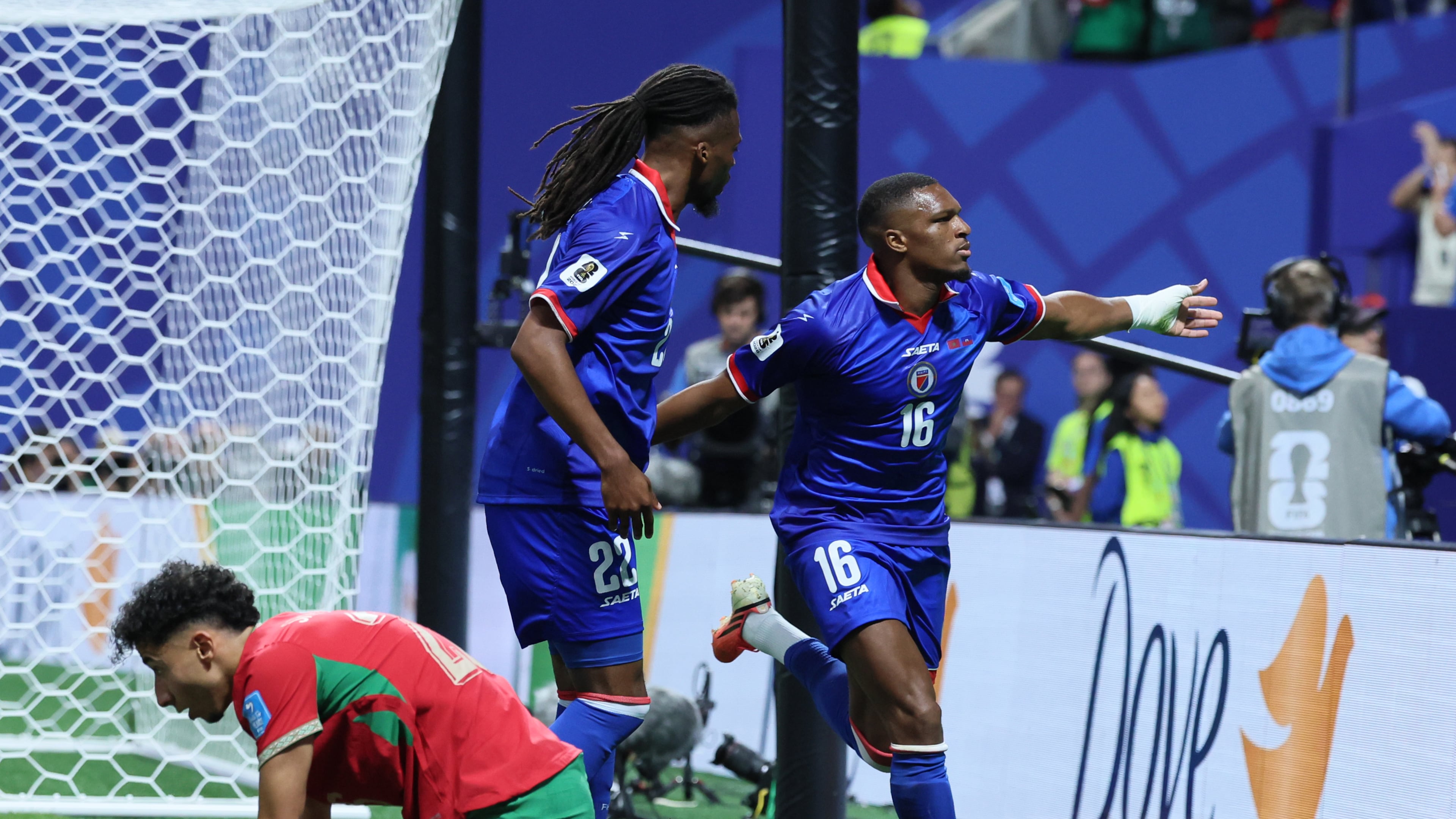 Haiti's Lenny Joseph, right, and teammate Jean-Kevin Duverne, left, celebrates his team's first goal in the 2026 World Cup and first in World Cup competition 52 years, as Morocco's Anass Salah Eddine is dejected, during first half of Morocco vs. Haiti Group C FIFA World Cup match at Atlanta Stadium (Mercedes-Benz Stadium) on Wednesday, June 24, 2026. (Jason Getz/AJC)