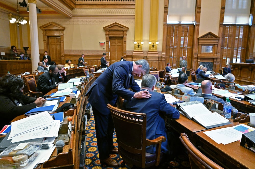 State Sen. Marty Harbin, R-Tyrone, left, seen conferring with with then state Sen. John Kennedy at the Georgia Capitol in 2022. (Hyosub Shin/AJC)