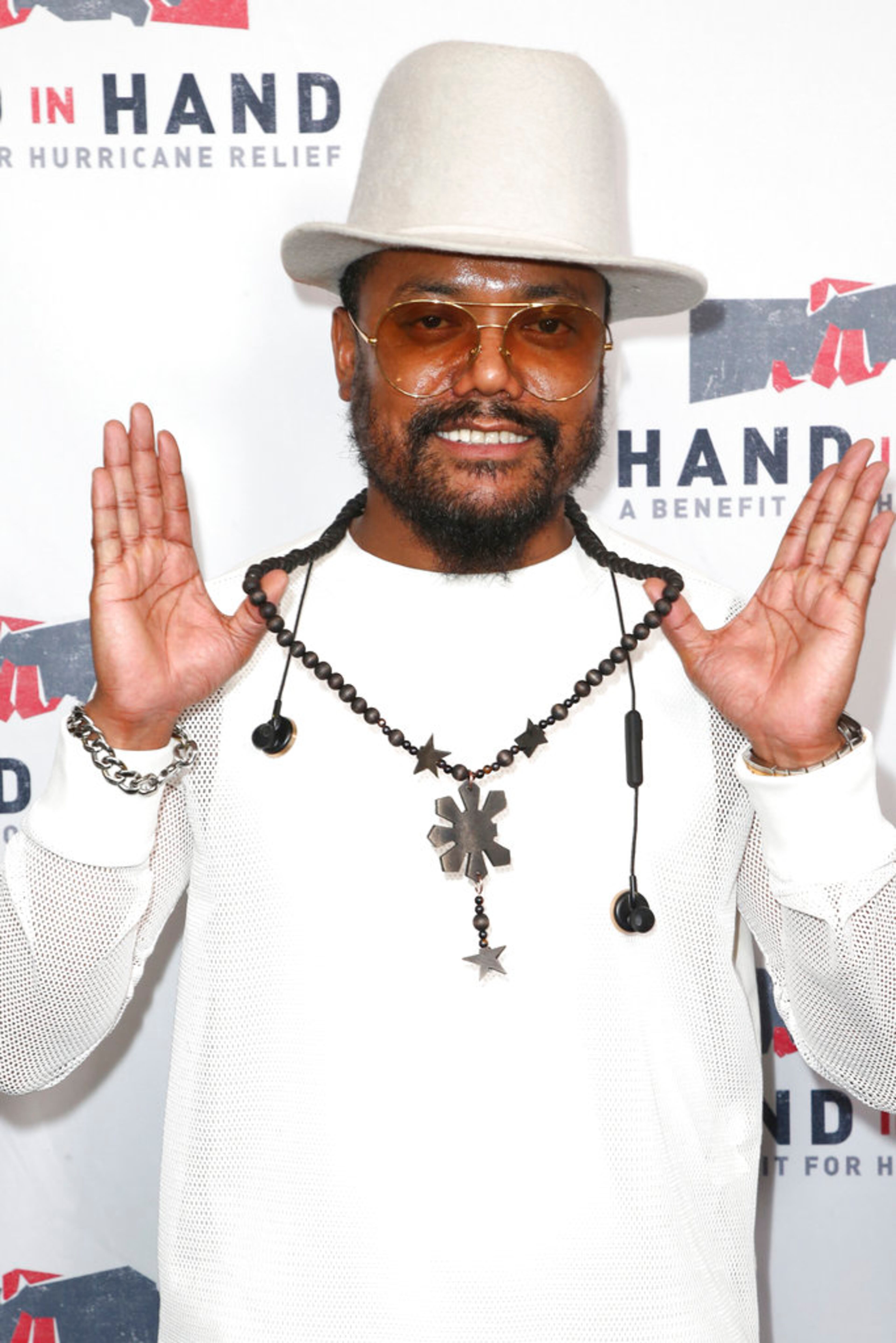 Allan Pineda Lindo, known as apl.de.ap, attends the Hand in Hand: A Benefit for Hurricane Harvey Relief held at Universal Studios Back Lot on Tuesday, Sept. 12, 2017 in Universal City, Calif. (Photo by John Salangsang/Invision/AP)