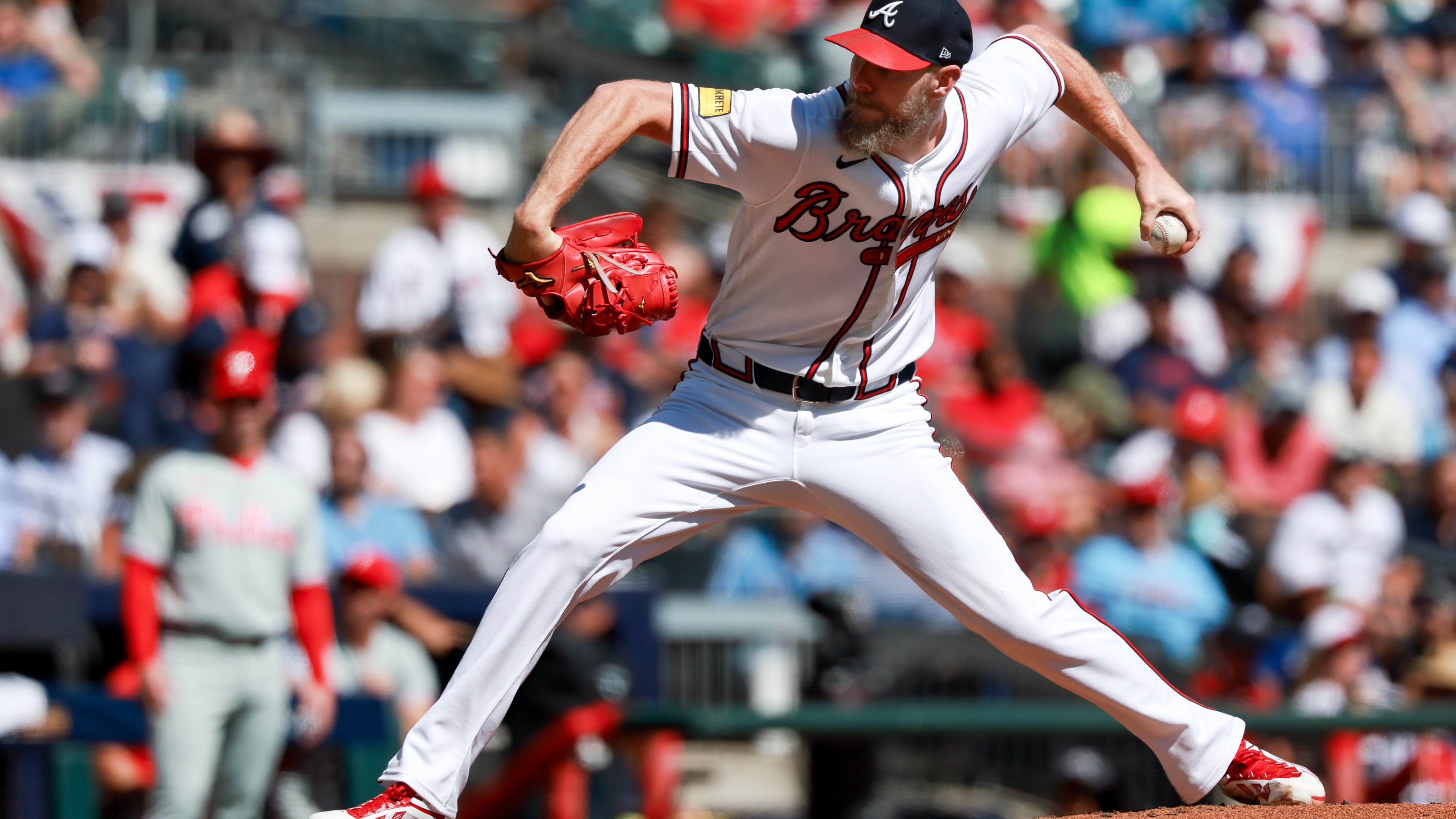 Atlanta Braves pitcher Chris Sale (51) delivers to a Philadelphia Phillies batter during the second inning of Game 1 of a MLB National League Wild Card playoff series between the Atlanta Braves and the Philadelphia Phillies, Tuesday, Sept. 29, 2026, in Atlanta. (Jason Getz/AJC)