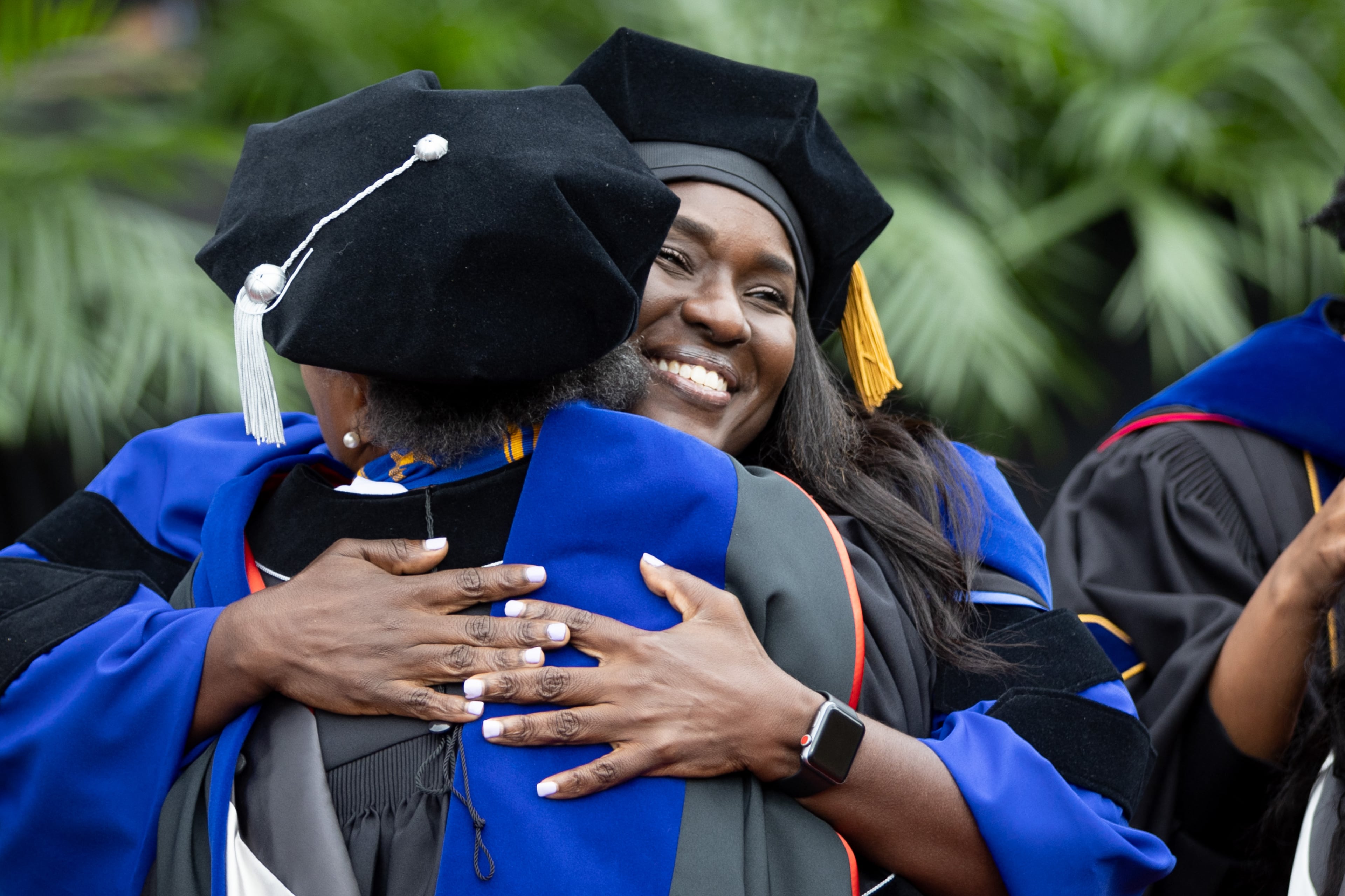Emotions run high after the doctoral hooding ceremony during the Atlanta University commencement ceremonies in Panther Stadium on Saturday, May 20, 2023. (Steve Schaefer / steve.schaefer@ajc.com)