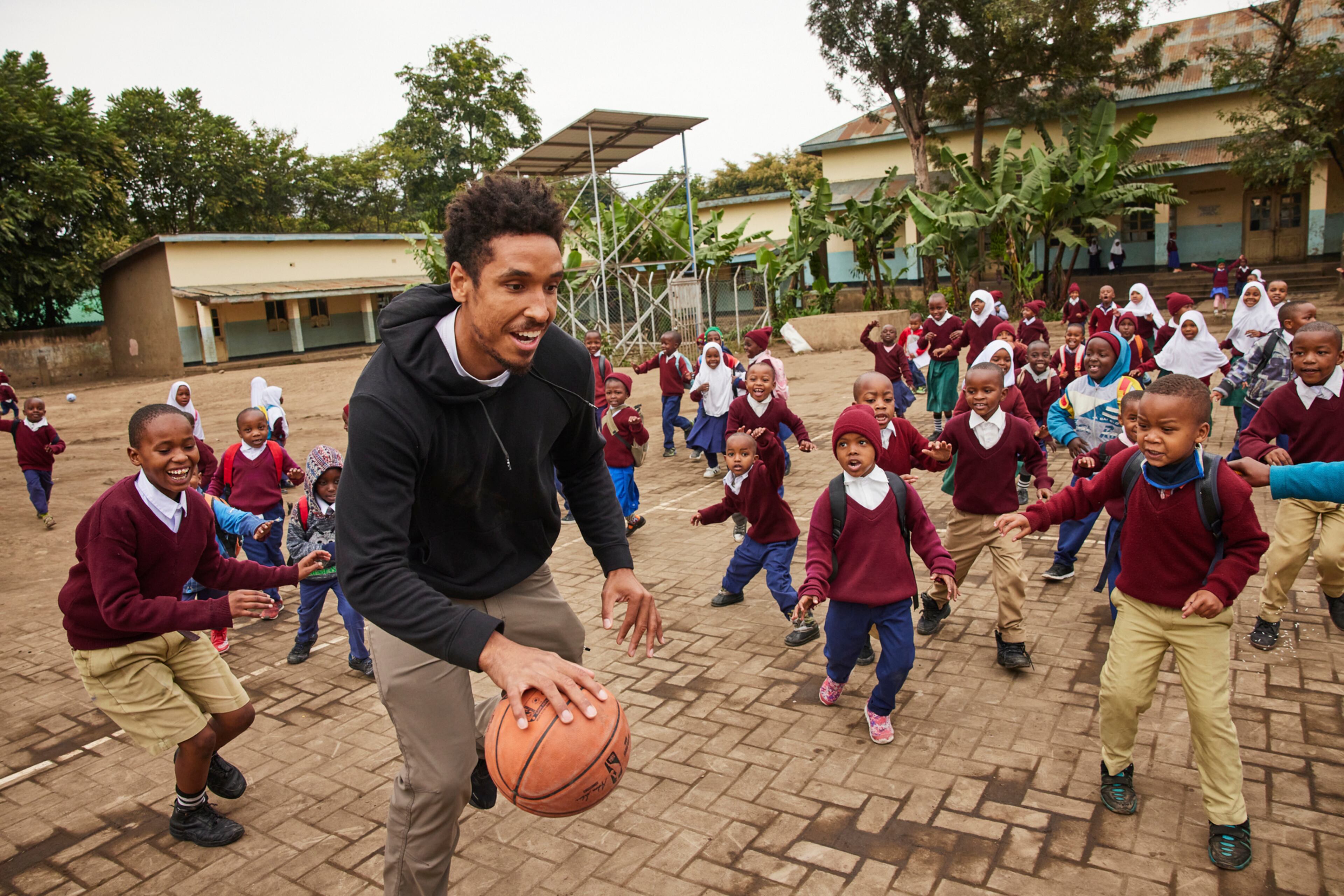 Malcolm Brogdon and his family foundation recently made a trip to Tanzania and Kenya. Brogdon gets in some basketball with students.
