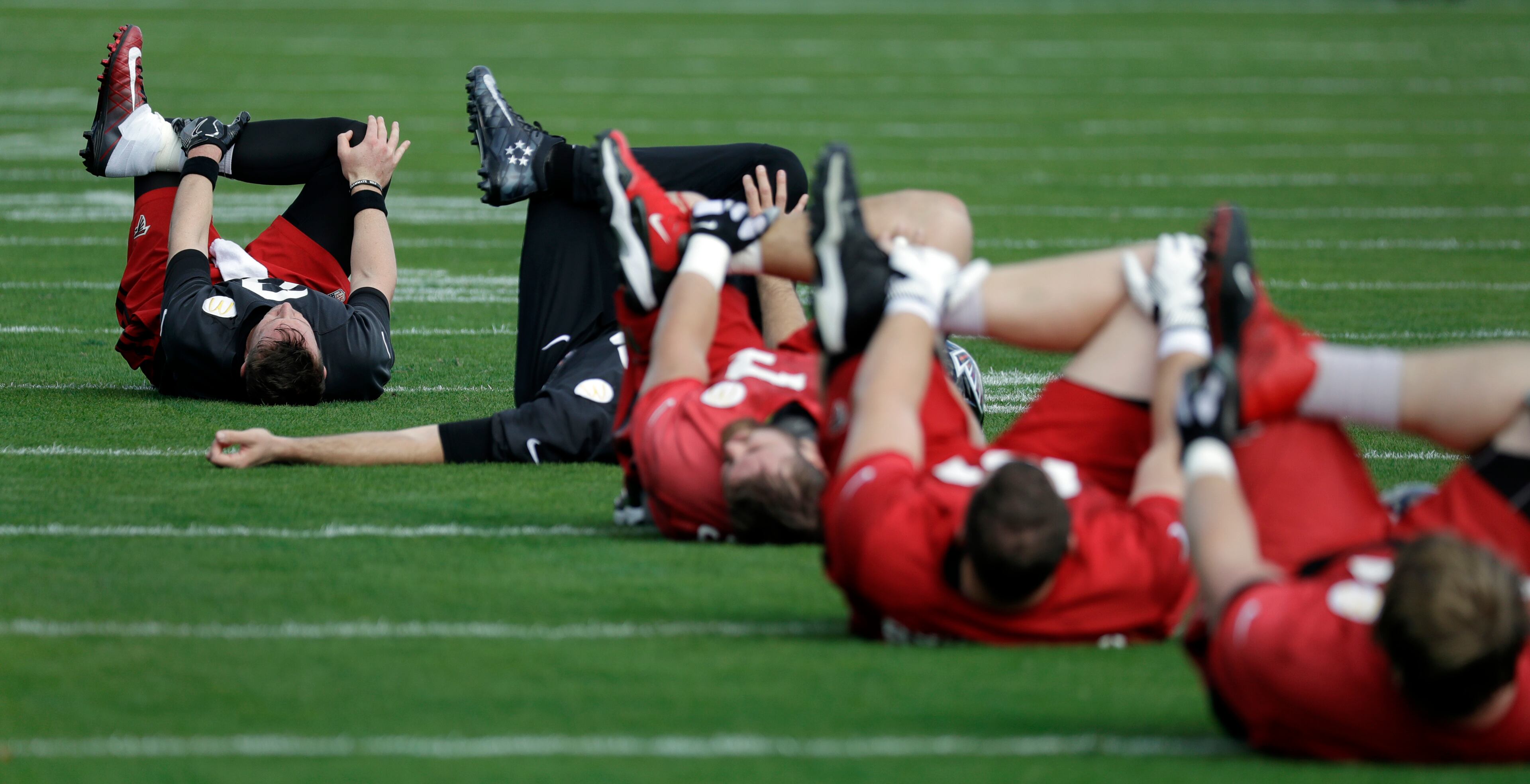 Atlanta Falcons quarterback Matt Ryan, left, stretches with teammates during a practice for the NFL Super Bowl 51 football game Wednesday, Feb. 1, 2017, in Houston. Atlanta will face the New England Patriots in the Super Bowl Sunday. (AP Photo/Eric Gay)