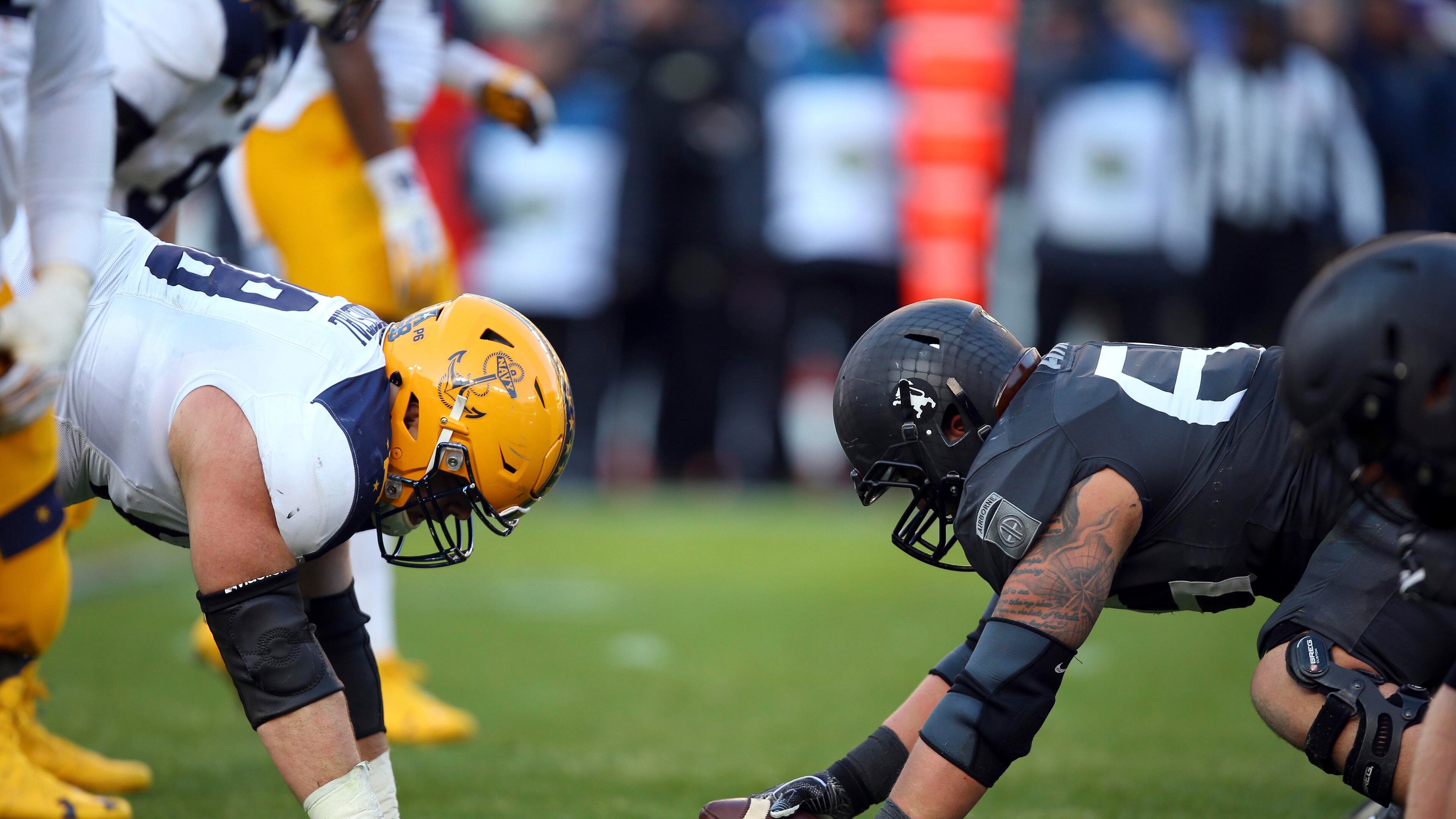 The football teams from Army and Navy will meet for the 118th time this year. Their rosters feature 21 players from metro Atlanta.