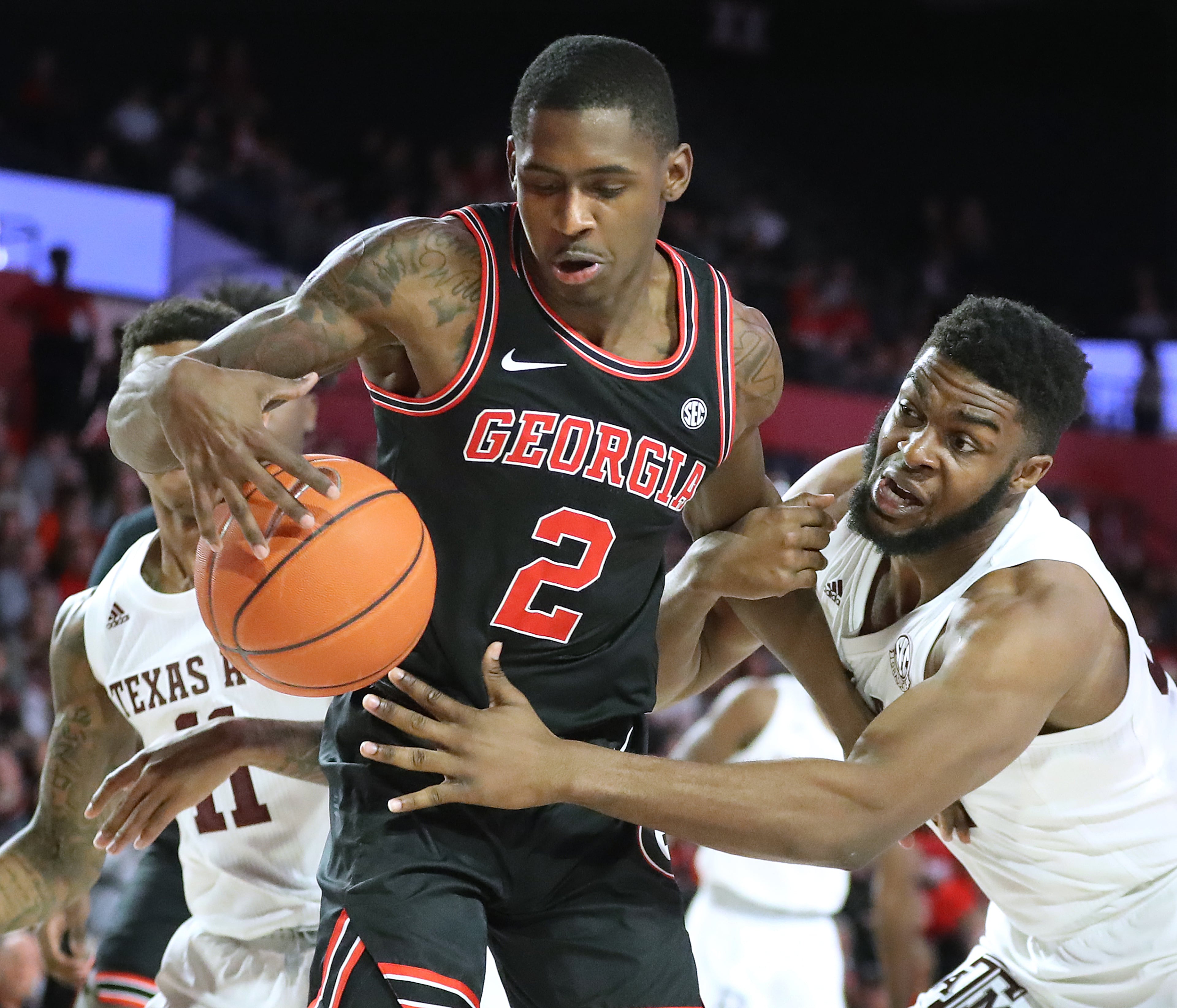 Feb. 1, 2020 Athens: Georgia guard Jordan Harris wins the defensive rebound battle against Texas A&M forward Josh Nebo in a NCAA college basketball game on Saturday, Feb. 1, 2020, in Athens. Curtis Compton ccompton@ajc.com