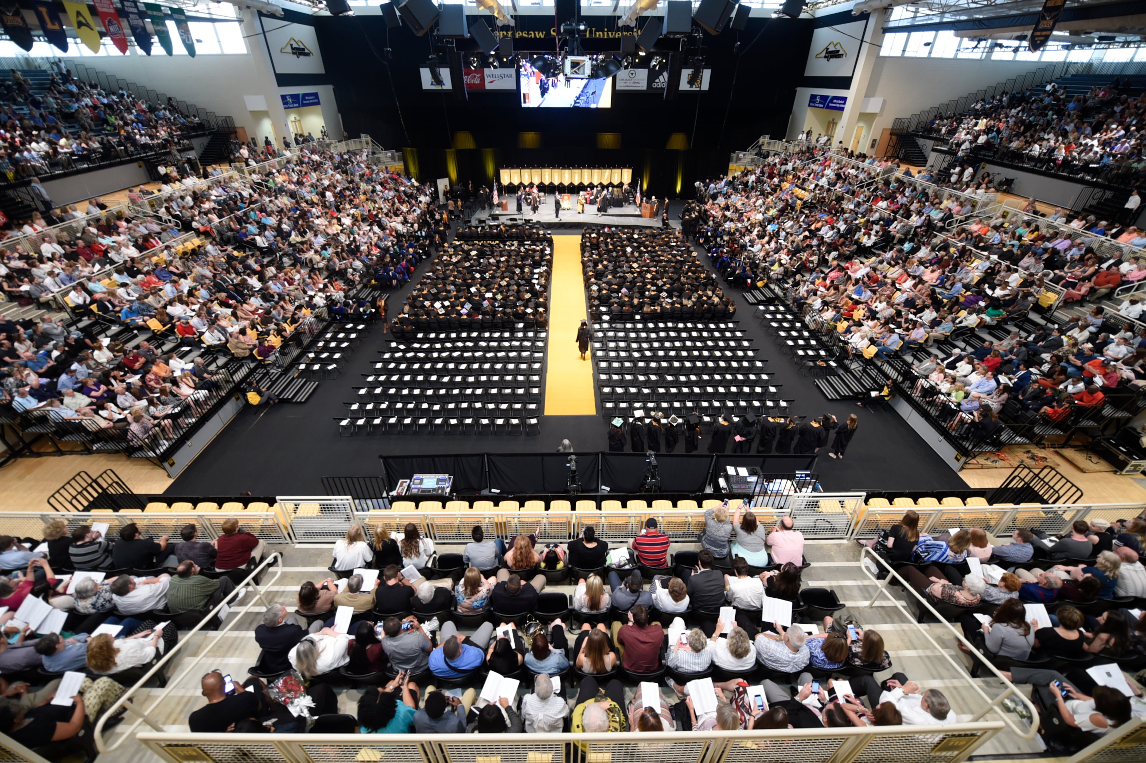 May 10, 2017, Atlanta, Georgia - Students along with their family and friends from Kennesaw State University in the College of Humanities and Social Sciences attend their Commencement ceremony to graduate from the university in Kennesaw, Georgia, on May 10, 2017. (HENRY TAYLOR / HENRY.TAYLOR@AJC.COM)