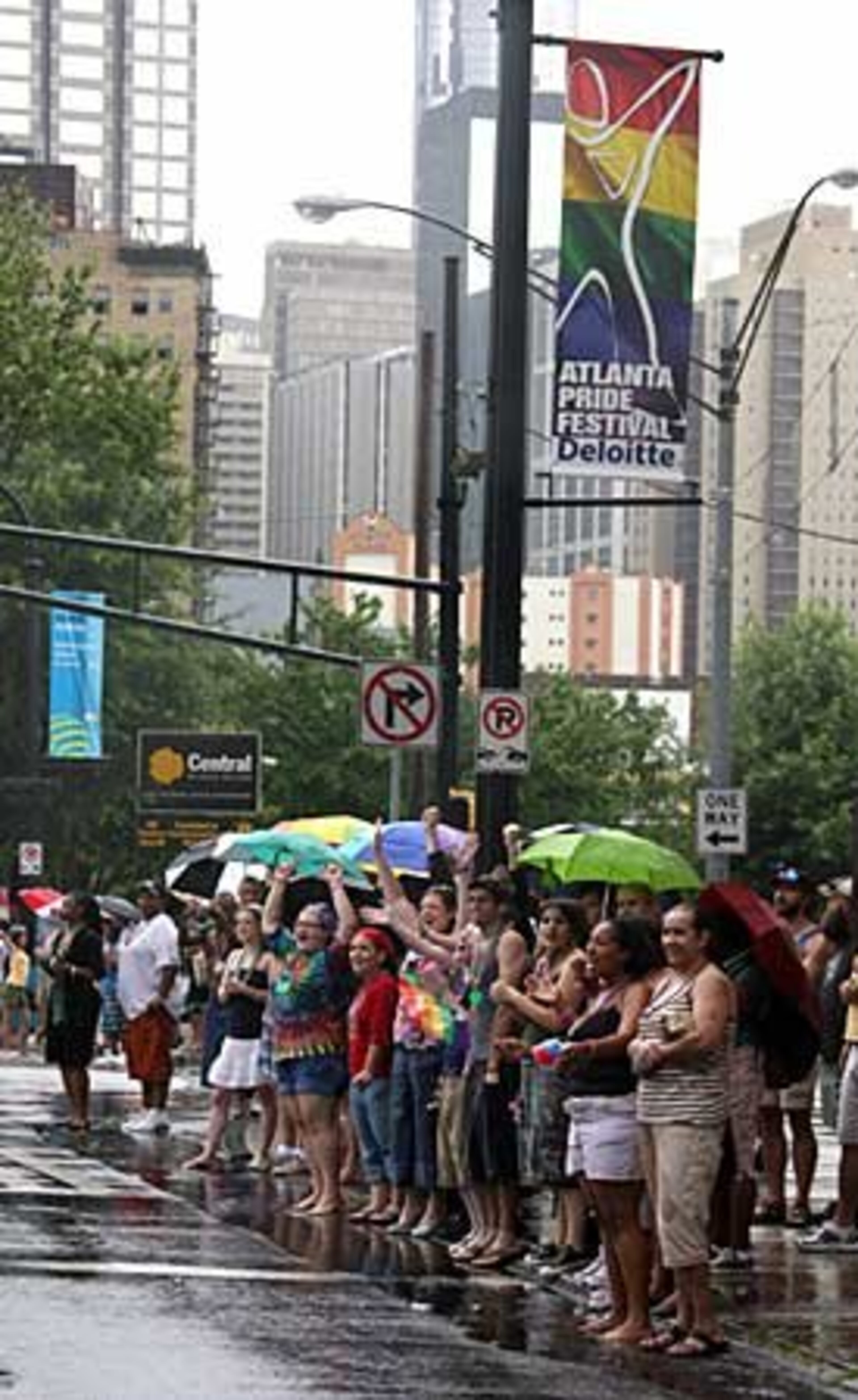 Part of the large crowd gathered along Peachtree Street for the Atlanta Pride Parade.