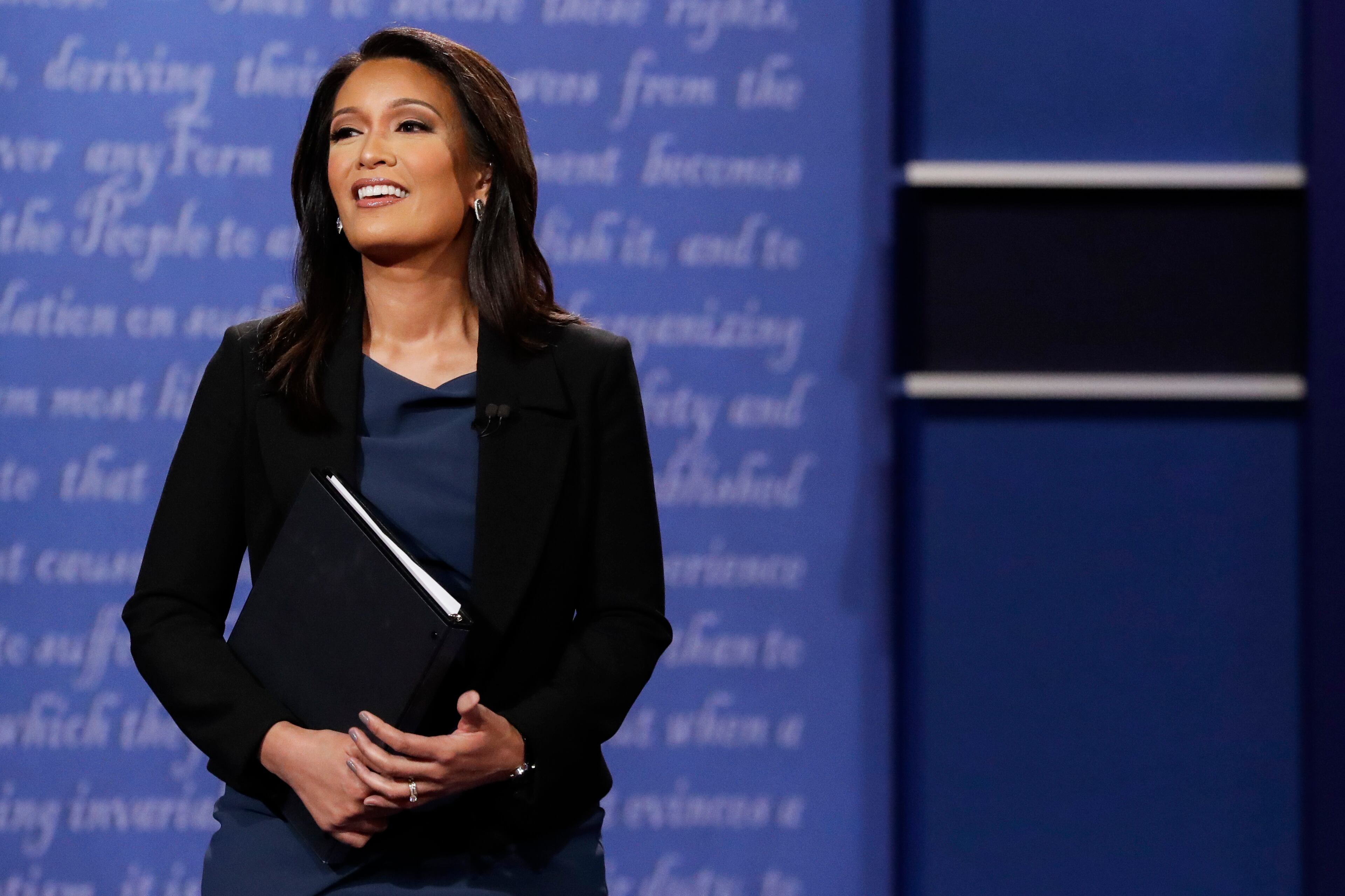 Moderator Elaine Quijano of CBS News addresses the audience before the debate between Republican vice presidential nominee Gov. Mike Pence and Democratic vice-presidential nominee Sen. Tim Kaine at Longwood University in Farmville, Va., Tuesday, Oct. 4, 2016. (AP Photo/David Goldman)