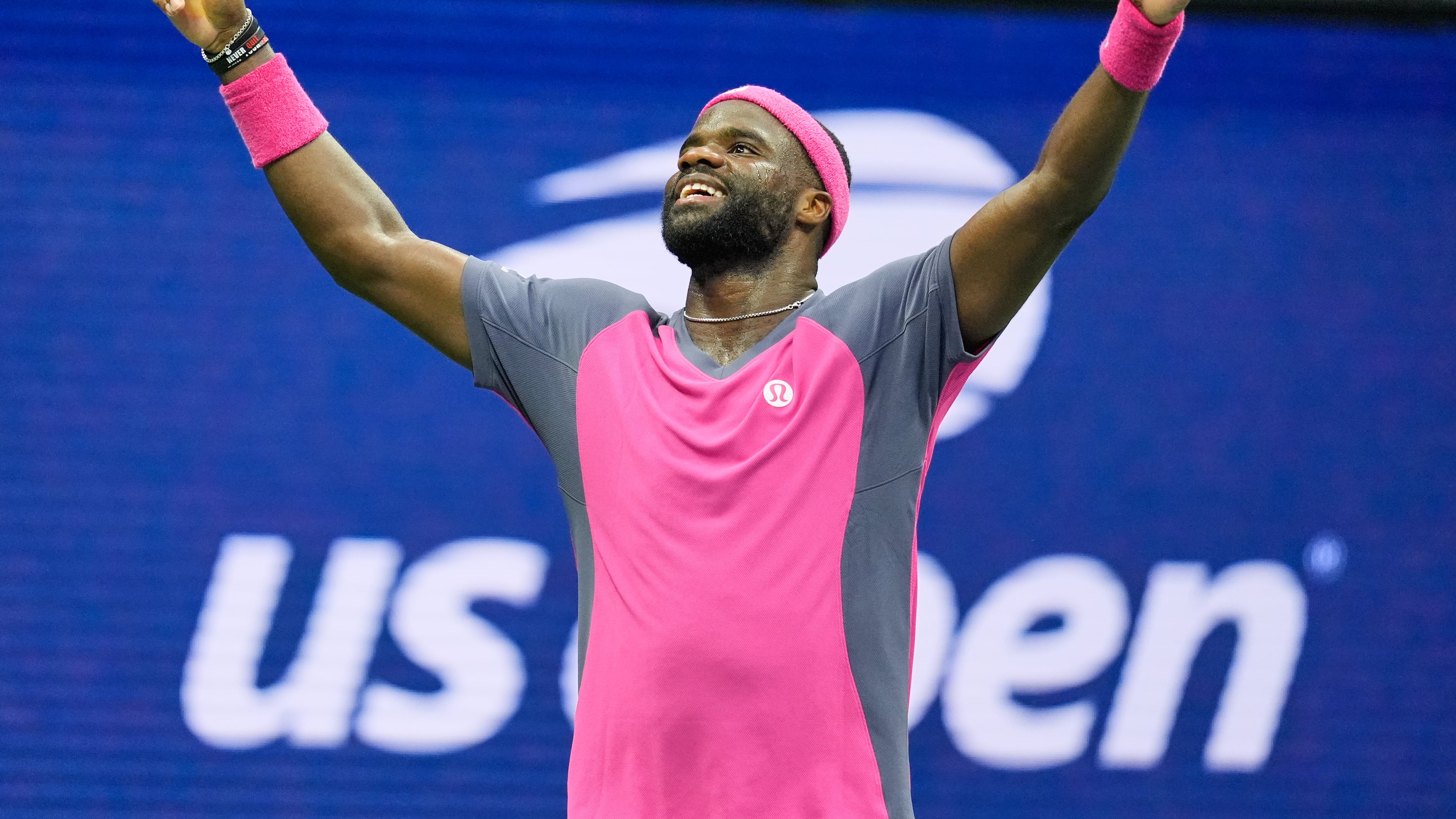 Frances Tiafoe, of the United States, celebrates winning a match against Alex Michelsen, of the United States, during the quarterfinal round of the U.S. Open tennis championships, Tuesday, Sept. 8, 2026, in New York. (AP Photo/Seth Wenig)