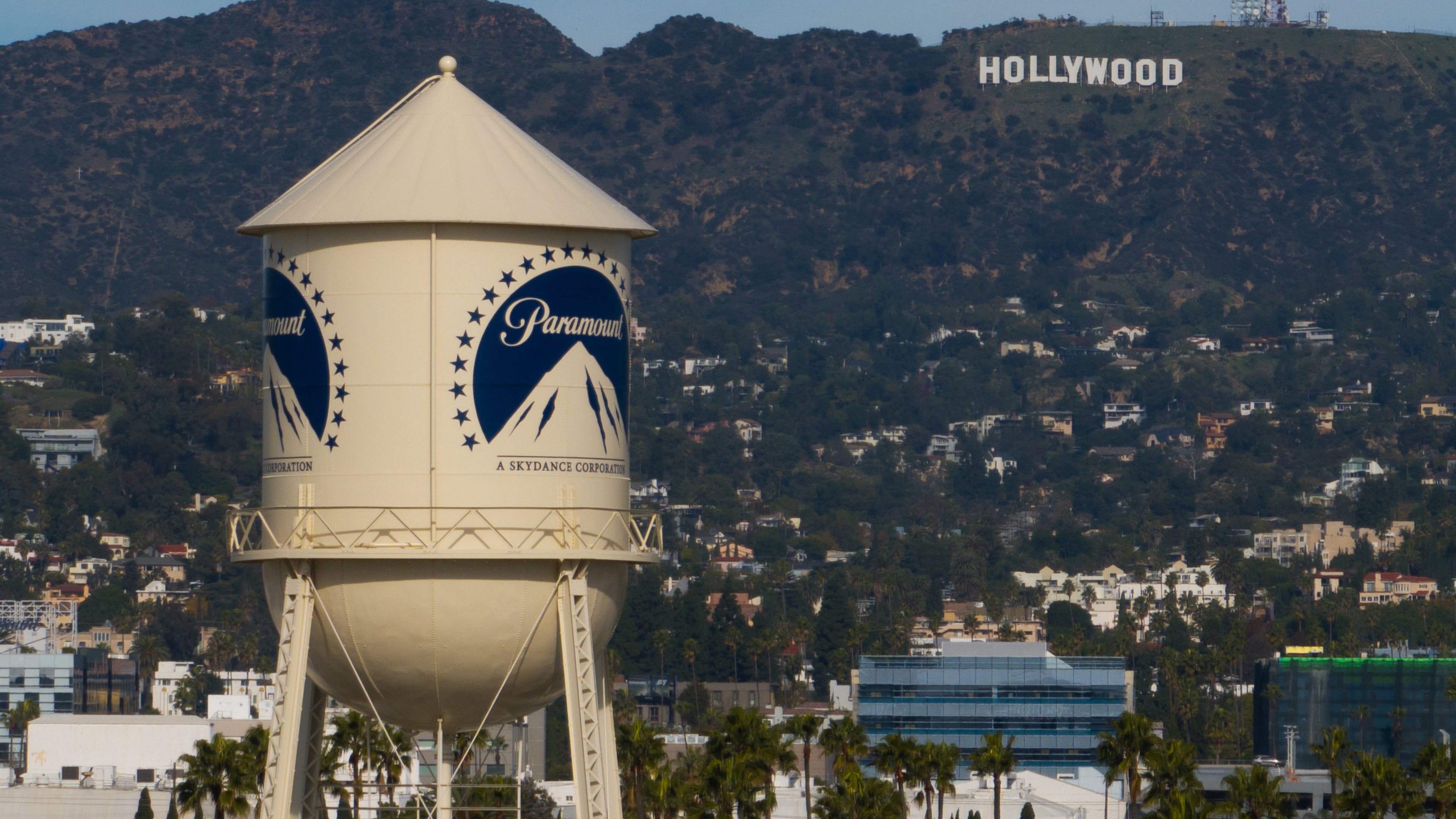 FILE - The Paramount Pictures water tower is seen in Los Angeles, Dec. 18, 2025, with the Hollywood sign in the distance. (AP Photo/Jae C. Hong, File)