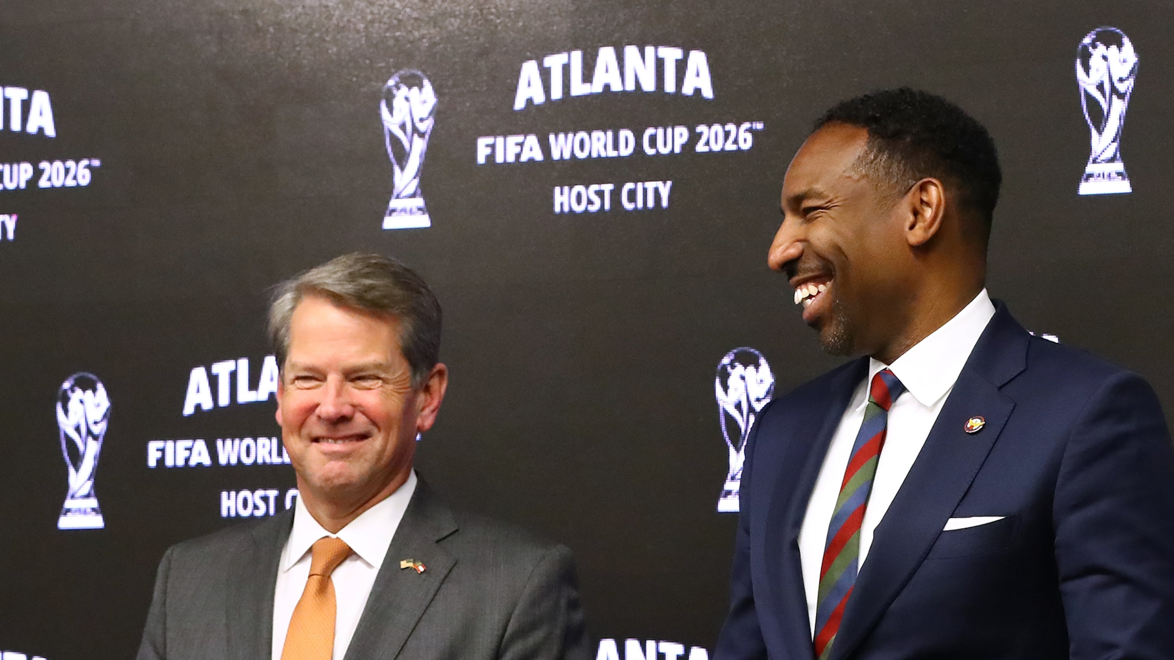 Gov. Brian Kemp (left) and Atlanta Mayor Andre Dickens shared a laugh during a news conference nearly three years ago about the 2026 World Cup. (Curtis Compton/AJC)
