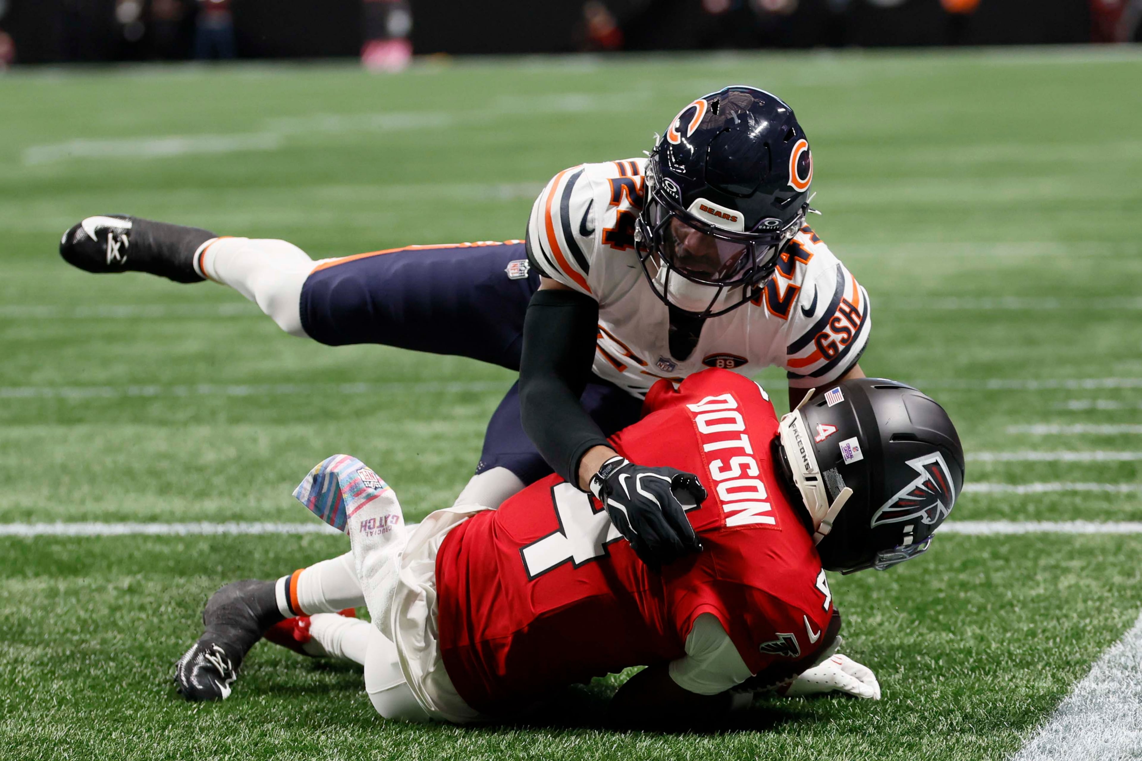 Atlanta Falcons wide receiver Jahan Dotson lands in the end zone after a catch to score during the first half of an NFL football game against the Chicago Bears at Mercedes-Benz Stadium in Atlanta on Sunday, Oct. 18, 2026. (Miguel Martinez/AJC)