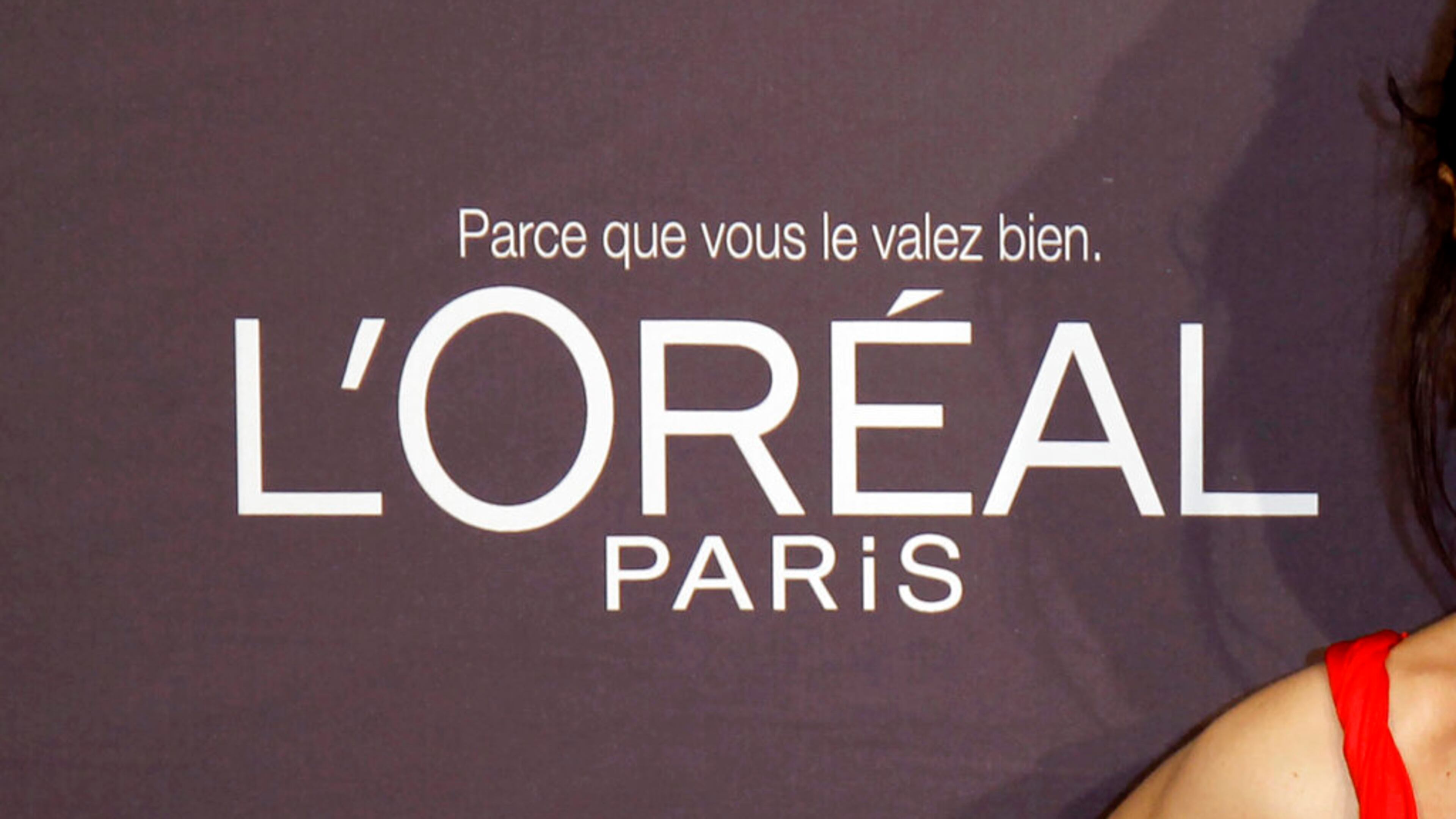 FILE - In this file photo dated Wednesday, May 23, 2012, the L'Oreal logo at the 65th international film festival, in Cannes, southern France. In a statement issued Saturday June 27, 2020, French cosmetics giant L'Oreal says it will remove words like "whitening" from its skincare products following criticism of the company amid global protests against racism. (AP Photo/Francois Mori, FILE)