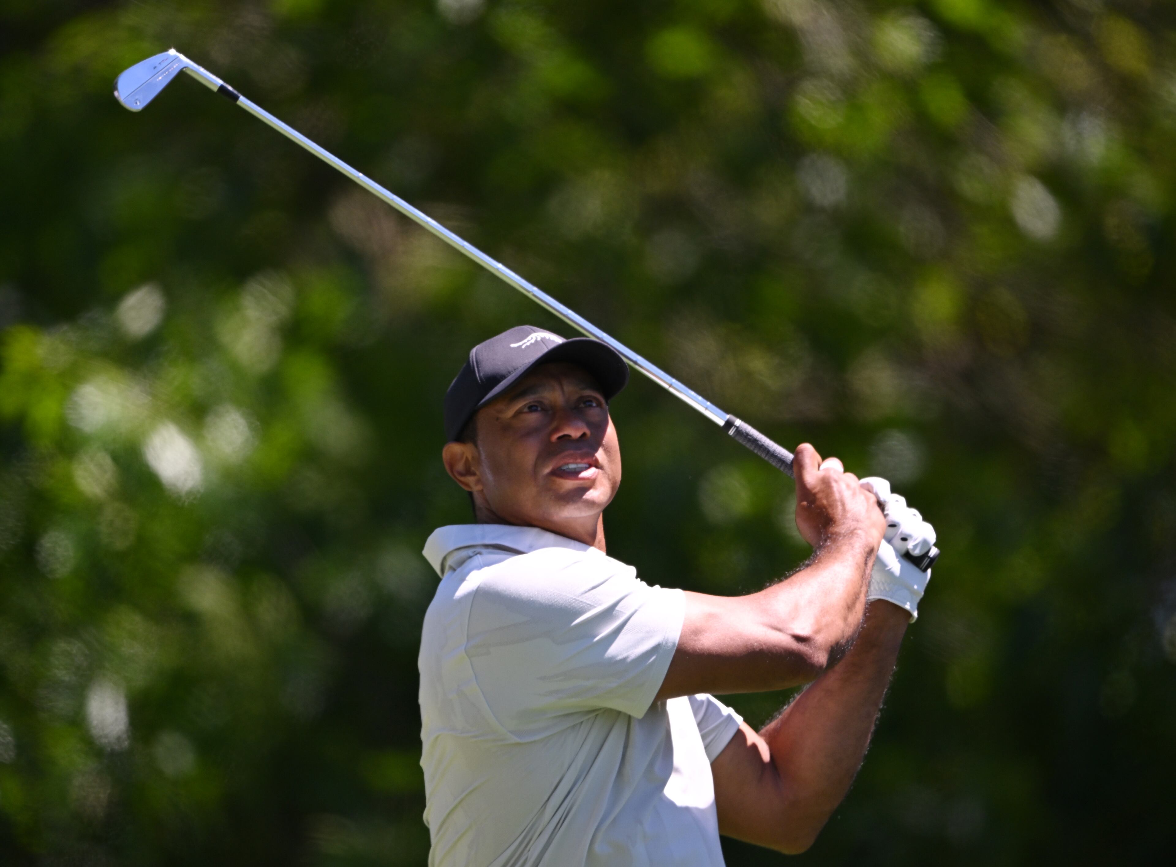 Tiger Woods tees off on fourth hole during third round at the 2024 Masters Tournament at Augusta National Golf Club, Saturday, April 13, 2024, in Augusta, Ga. (Hyosub Shin / Hyosub.Shin@ajc.com)