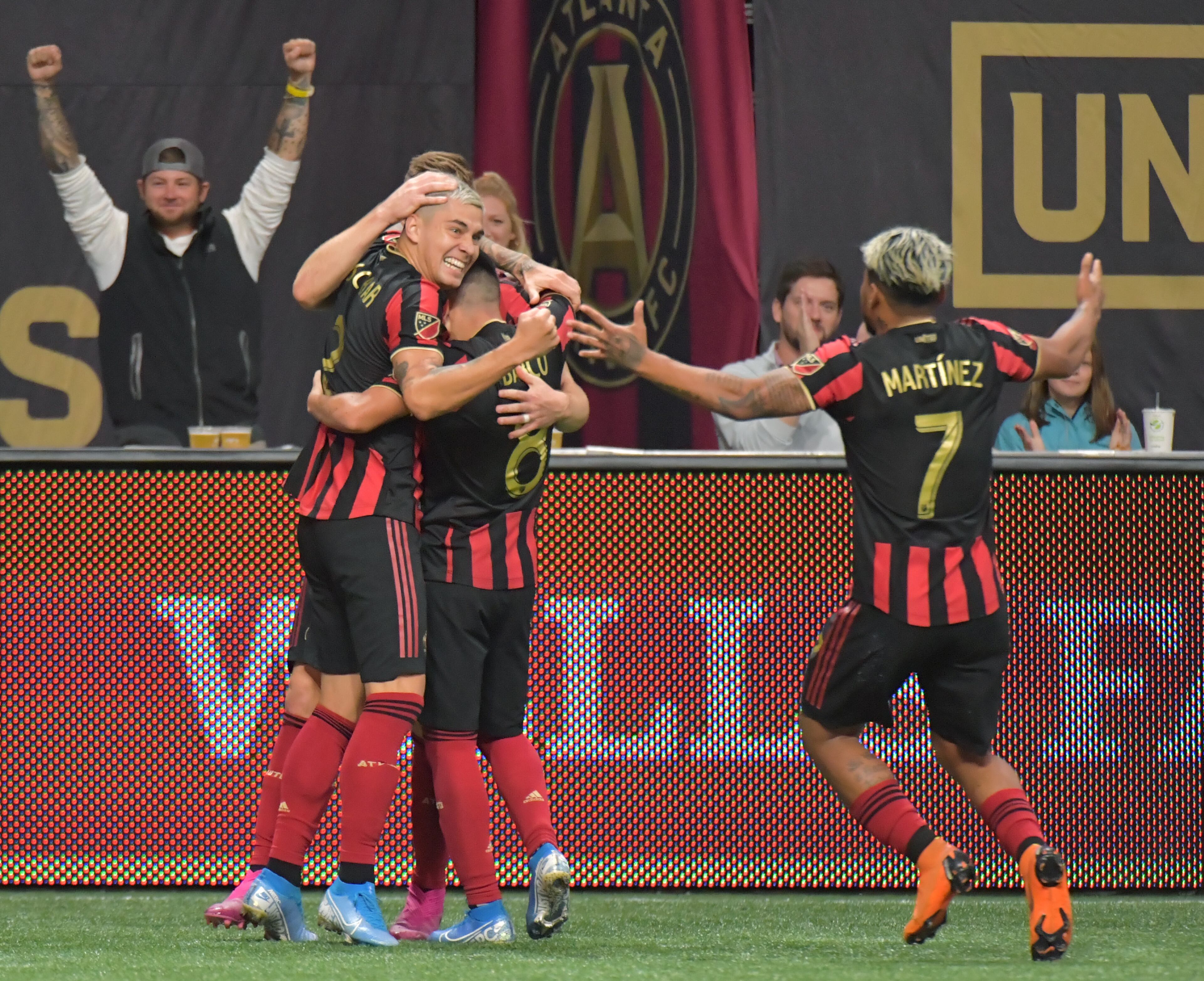 Atlanta United defender Franco Escobar (2) celebrates with teammates after he scored the game winning goal in the second half during the first round of the MLS playoffs at Mercedes-Benz Stadium on Saturday, October 19, 2019. Atlanta United won 1-0 over the New England Revolution. (Hyosub Shin / Hyosub.Shin@ajc.com)