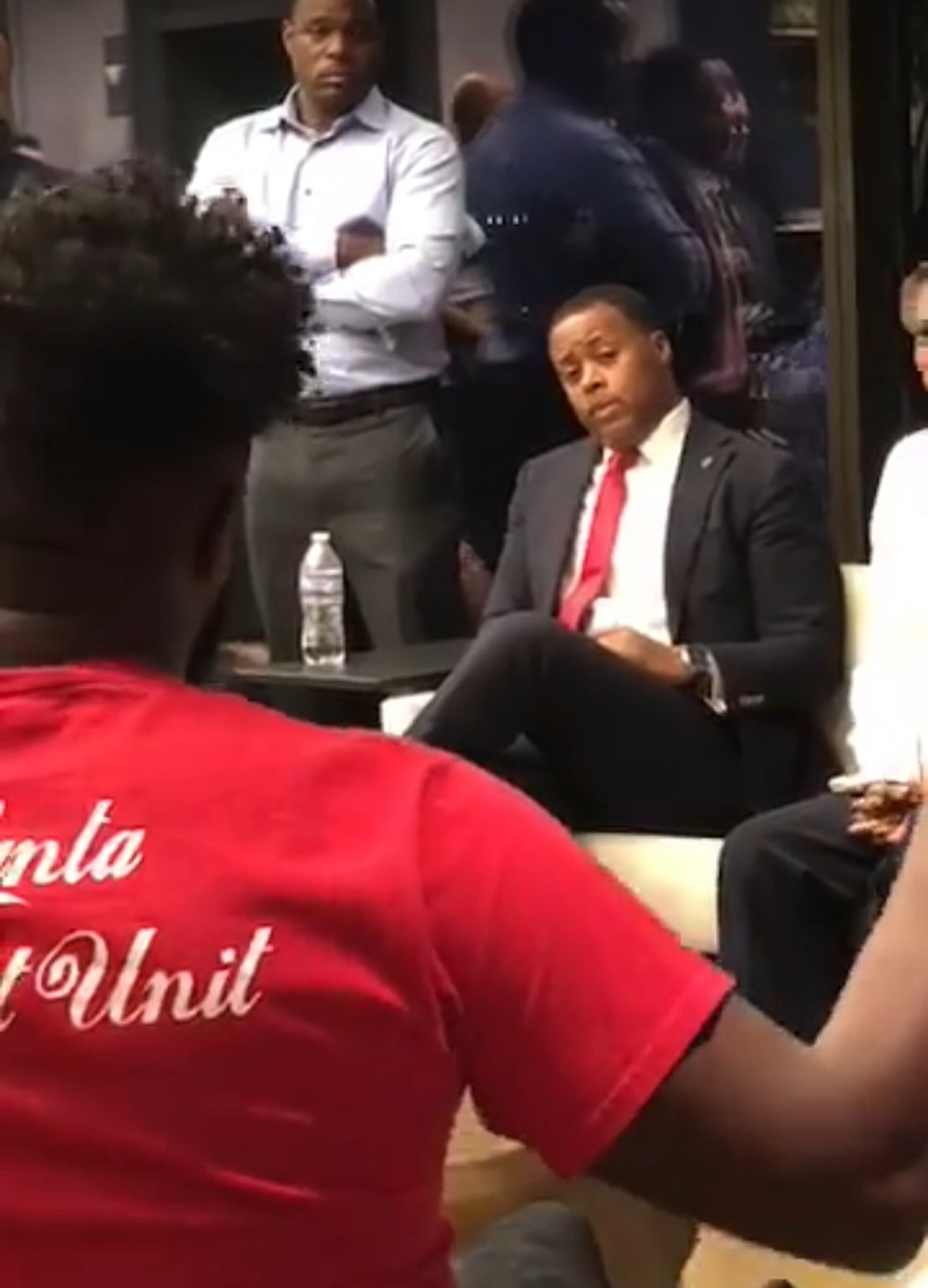 Atlanta Beltline CEO Clyde Higgs speaks with residents about the Murphy Crossing development after a meeting last fall. Screengrab of video