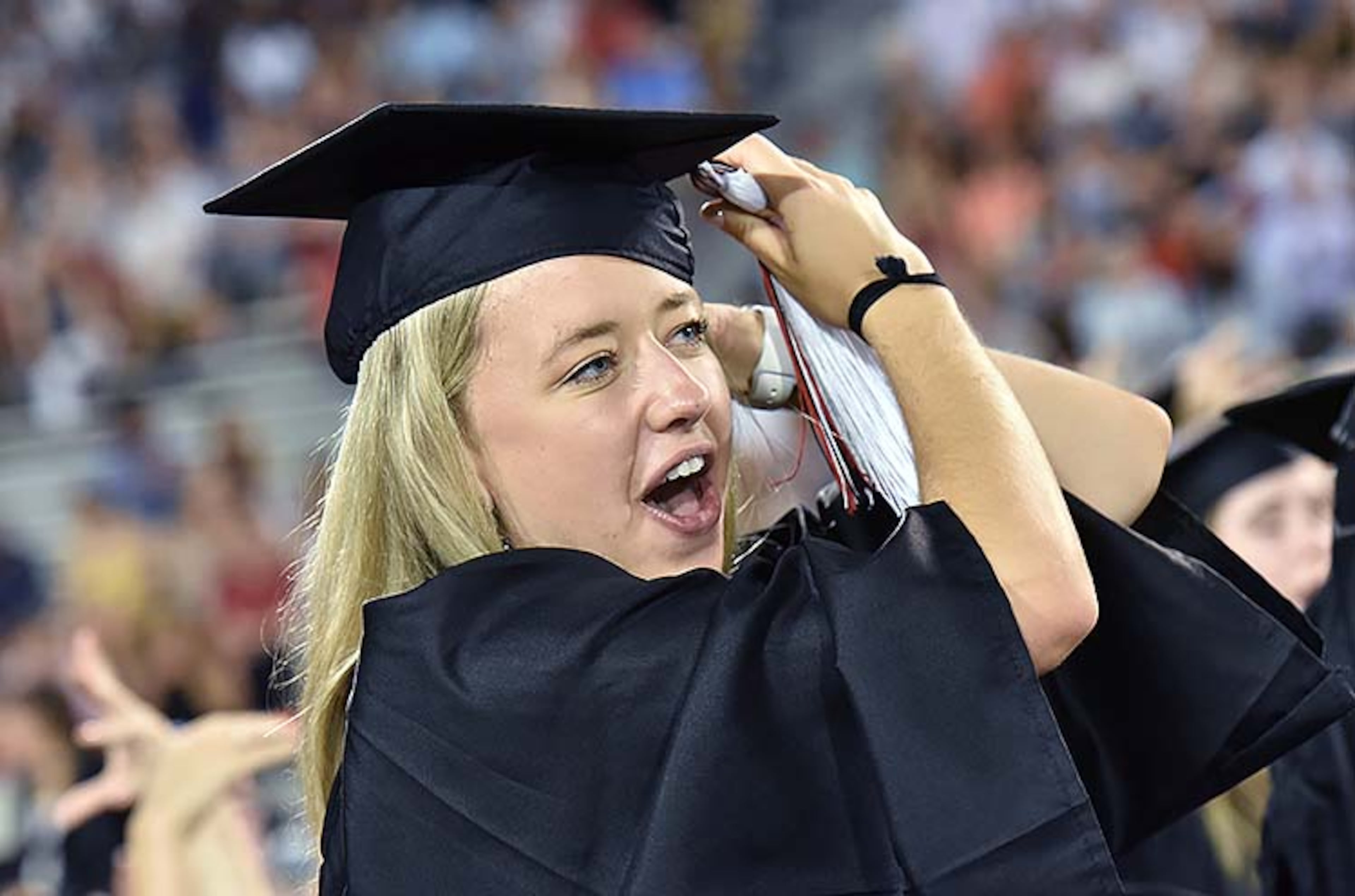 May 10, 2019 Athens - Josie Feron moves her tassel during UGA's 2019 spring undergraduate commencement ceremony at Sanford Stadium in Athens on Friday, May 10, 2019. HYOSUB SHIN / HSHIN@AJC.COM