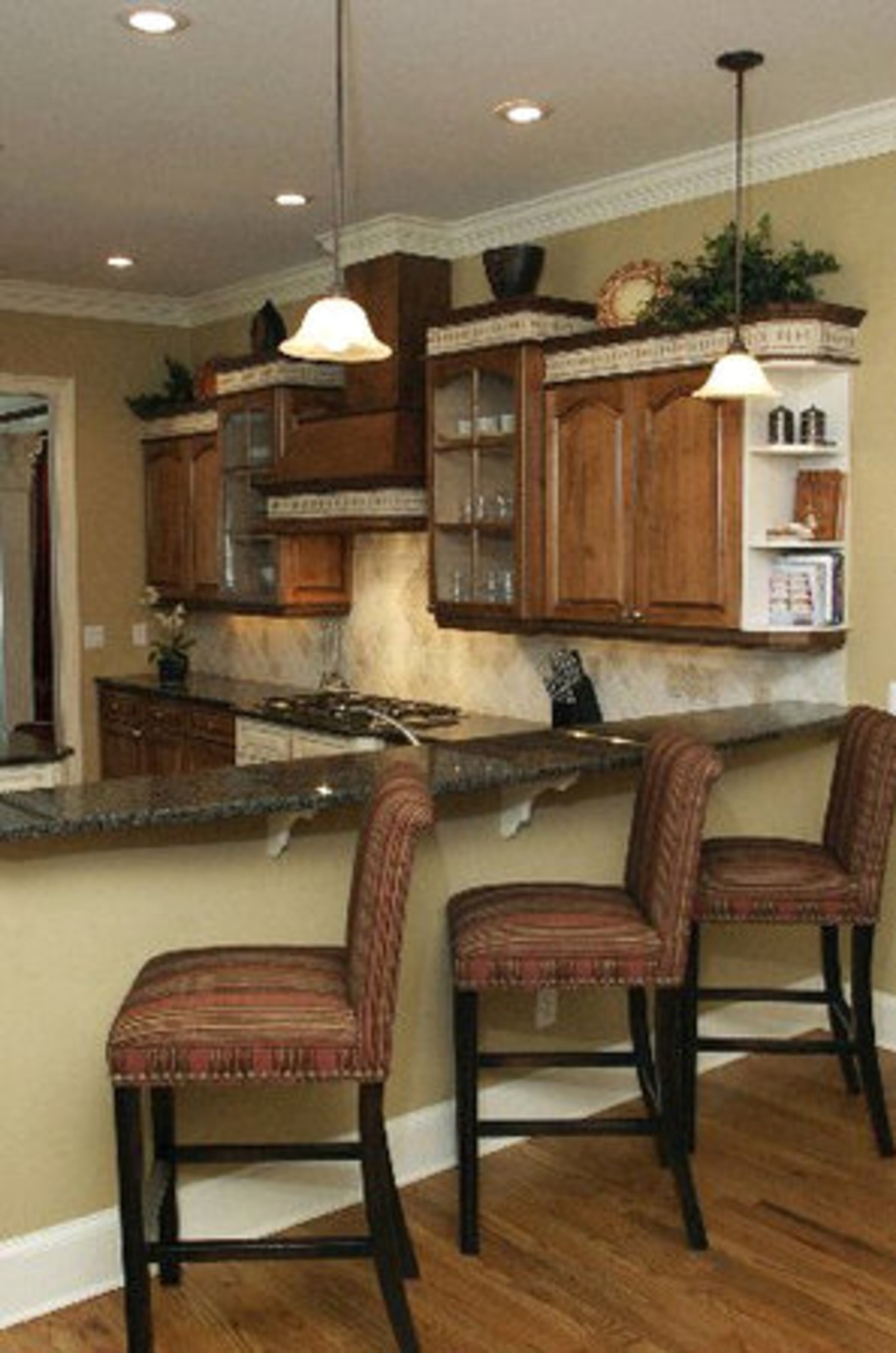 The kitchen's open floor plan caters to a young, active family that's on the go, though Rolonda admits she's also great at making reservations.