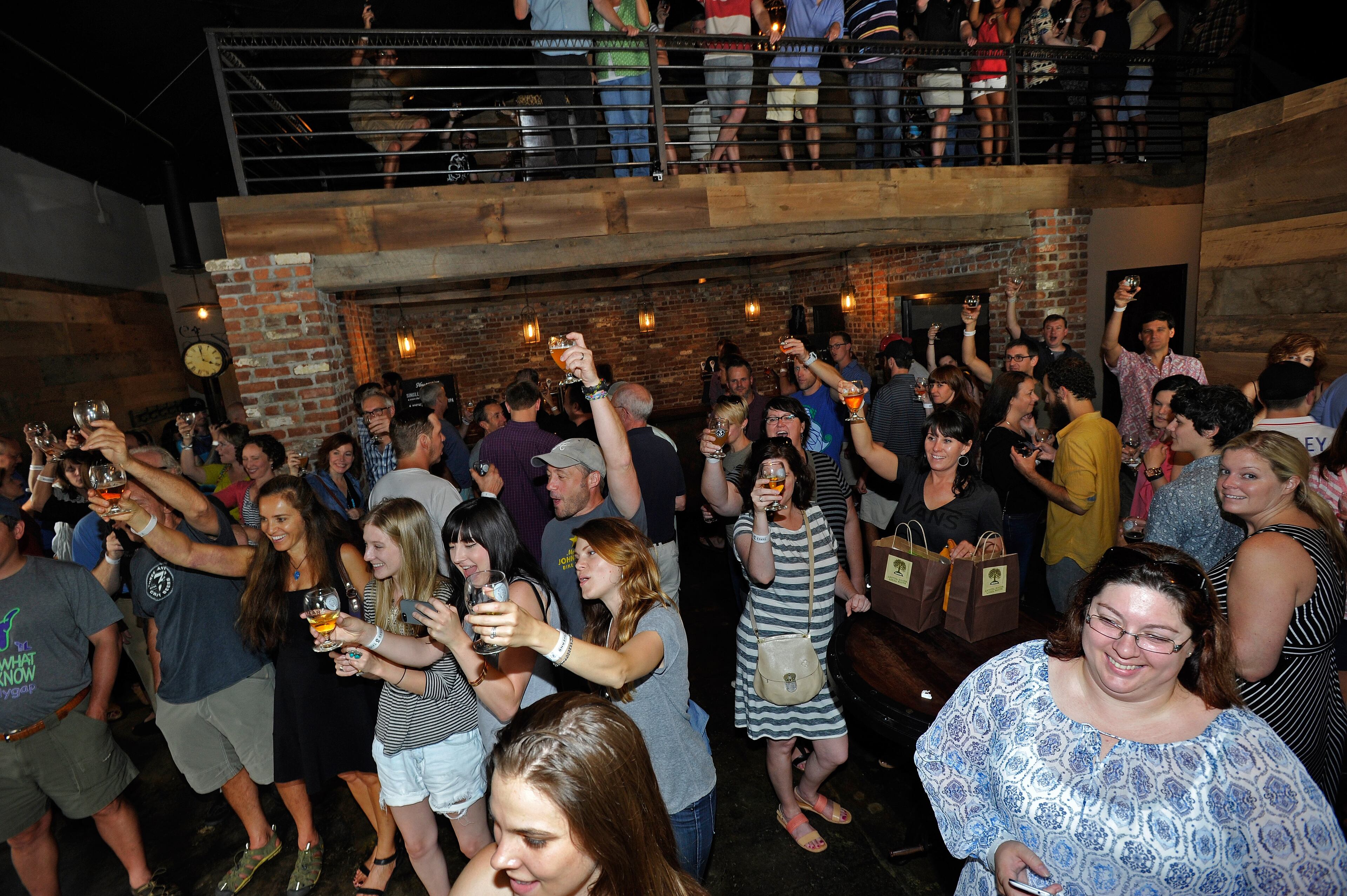 Three Taverns Craft Brewery celebrates its One-Year Anniversary with hundreds of beer aficionados on Saturday, July 19, 2014, in Decatur, Ga. David Tulis / AJC Special