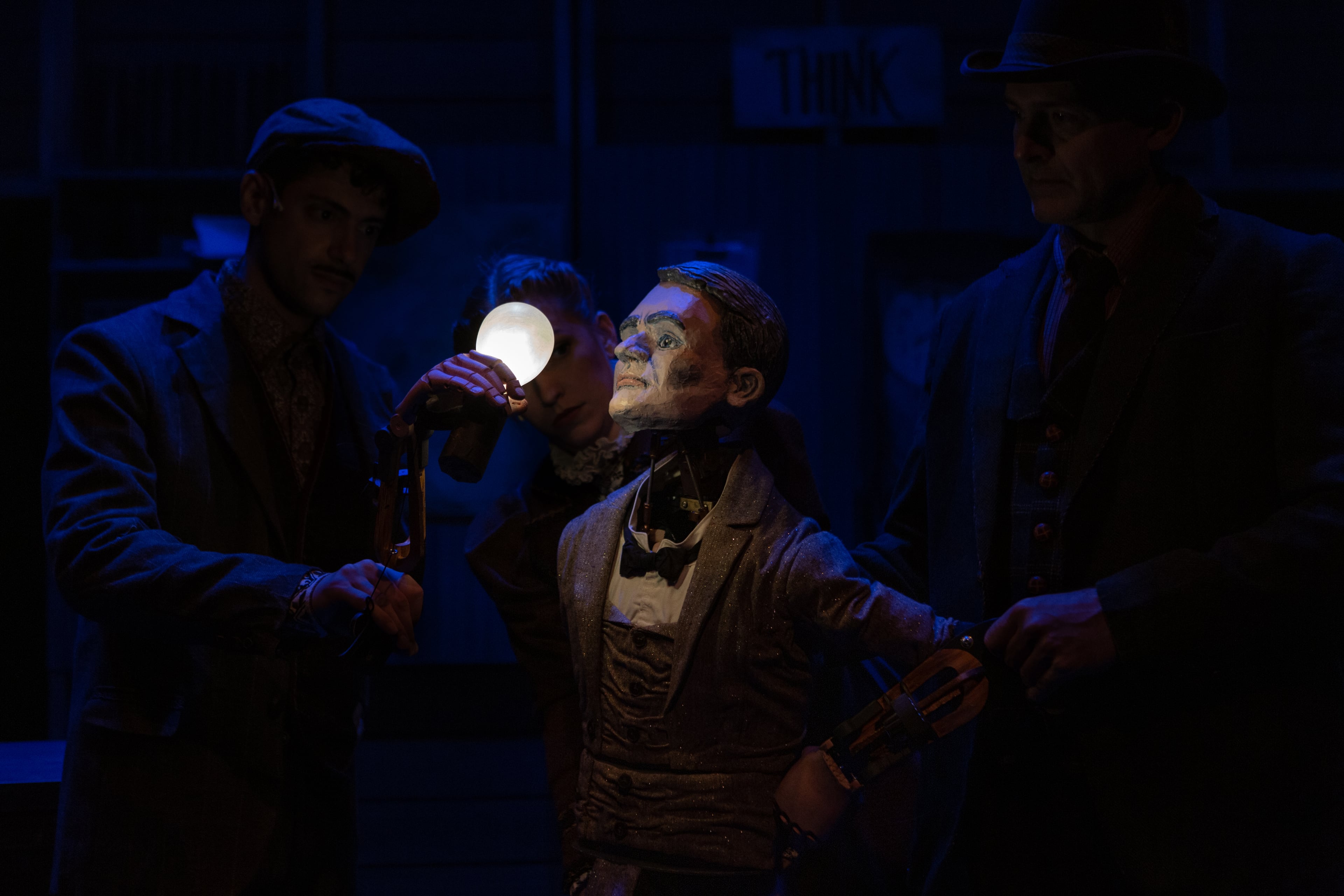 Edison admires his light bulb. (Photo courtesy of Center for Puppetry Arts/Stacey Bode)