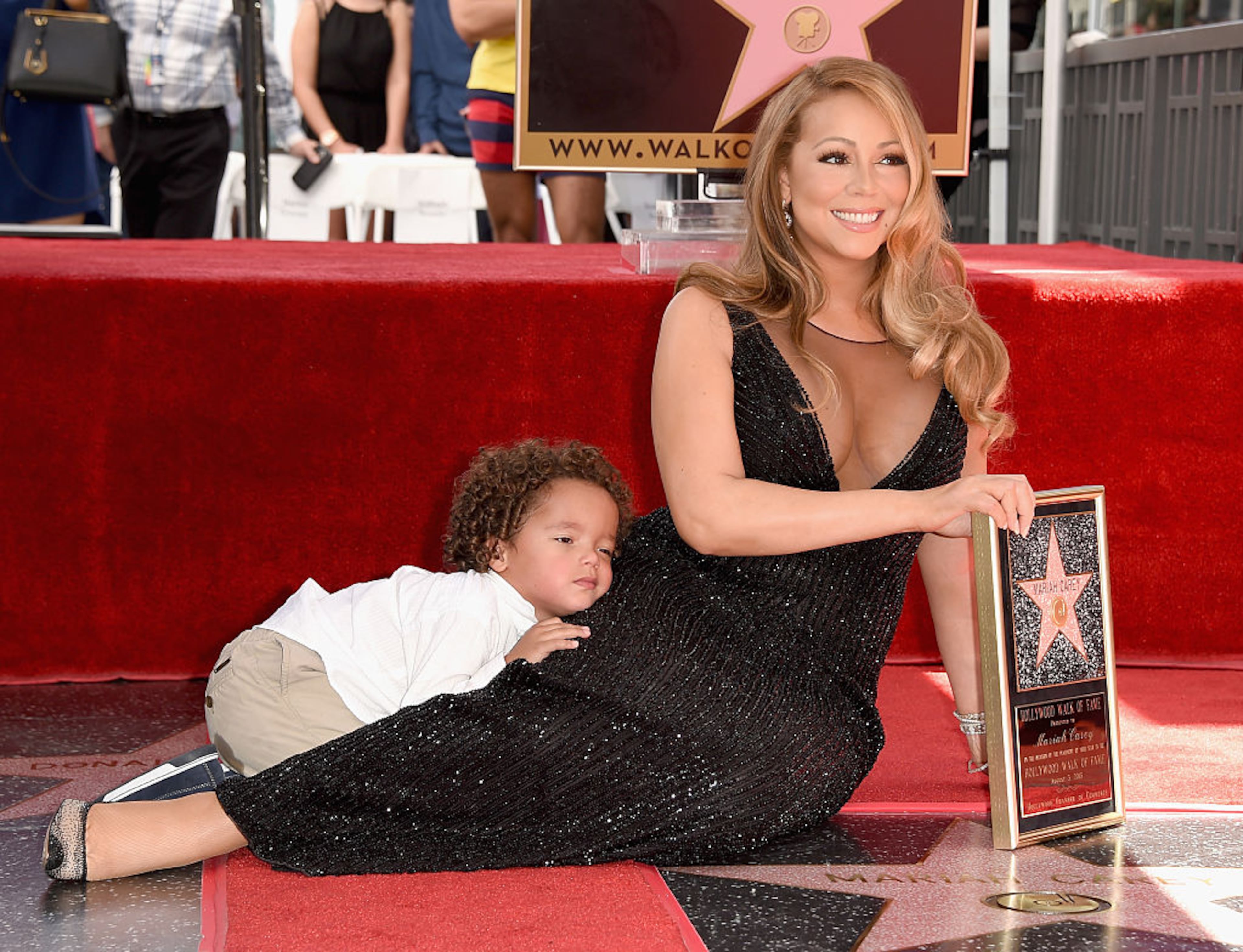 HOLLYWOOD, CA - AUGUST 05: Singer Mariah Carey (R), with Moroccan Cannon, is honored with Star on The Hollywood Walk of Fame on August 5, 2015 in Hollywood, California. (Photo by Kevin Winter/Getty Images)