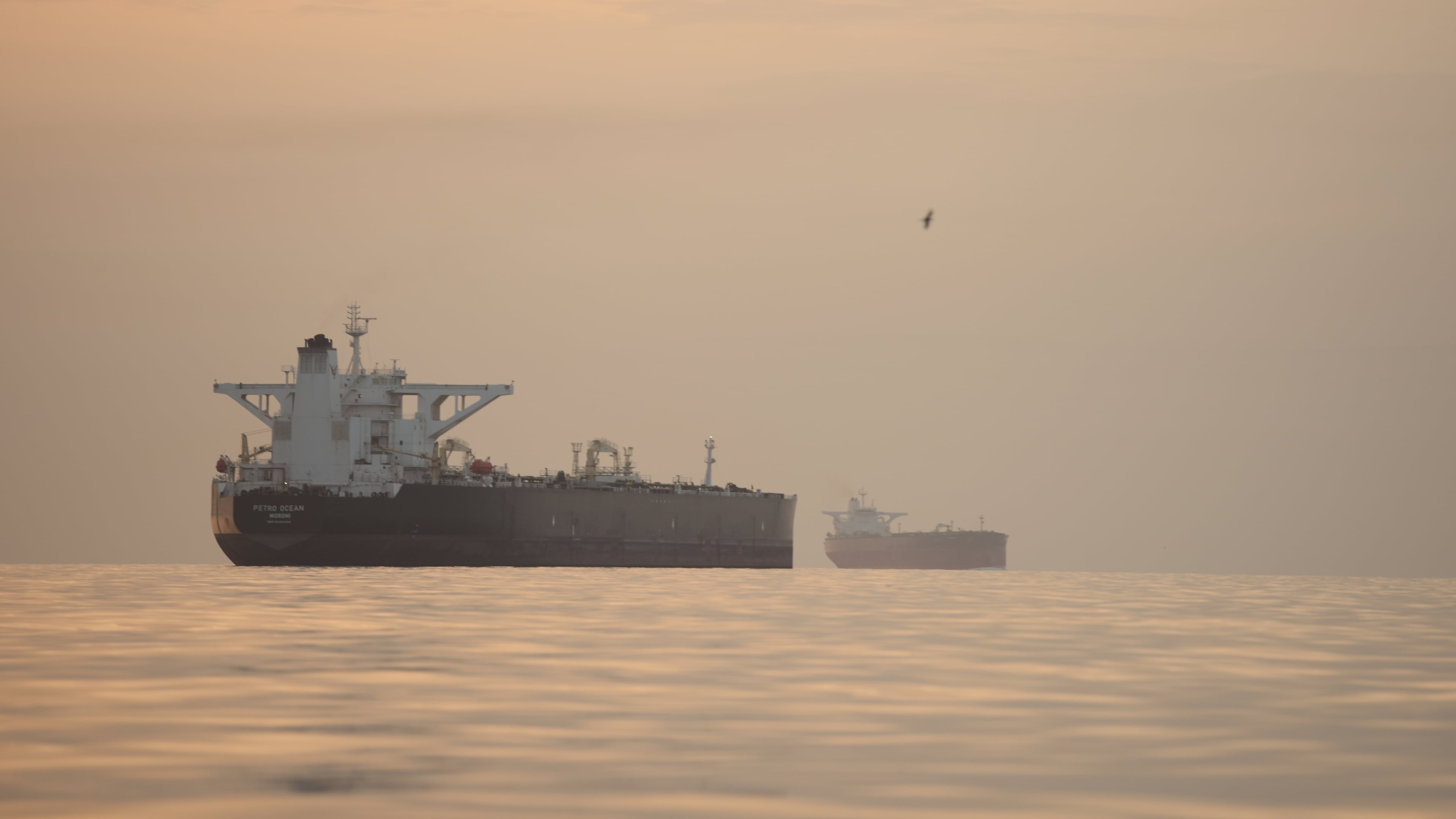 Tankers anchored in the Strait of Hormuz off the coast of Qeshm Island, Iran, Saturday, April 18, 2026. (AP Photo/Asghar Besharati)