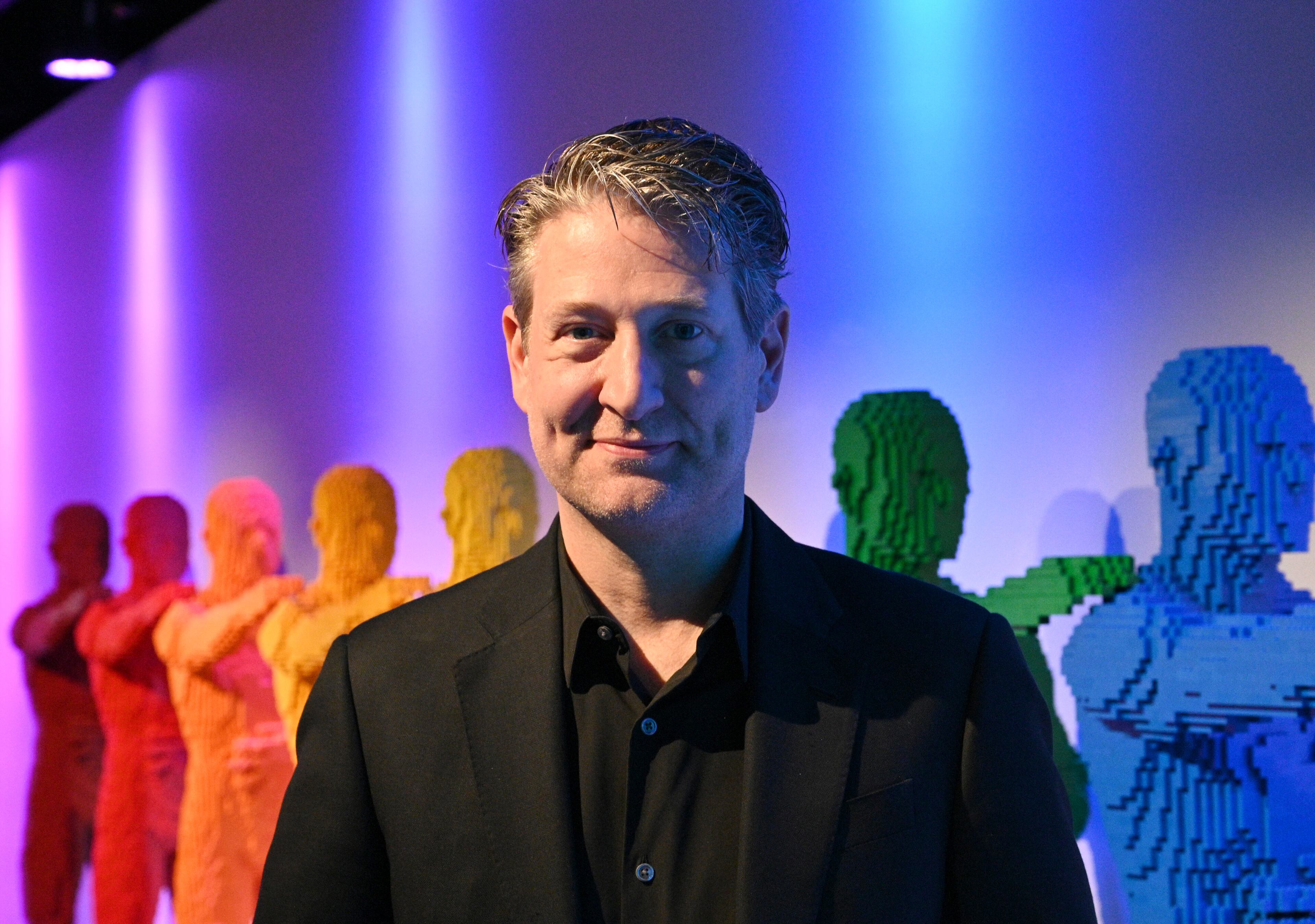 Portrait of LEGO artist Nathan Sawaya, at his "Art of the Brick Immersive Experience" exhibition at Exhibition Hub Atlanta Art Centre, Wednesday, April 19, 2023, in Doraville. The exhibition will feature many pieces and themes, including a room with oversized sculptures (25-foot long), over 70 works of art crafted from more than 1 million LEGO bricks, galleries celebrating human-kind and nature, and a short documentary about how Nathan creates his works. (Hyosub Shin / Hyosub.Shin@ajc.com)