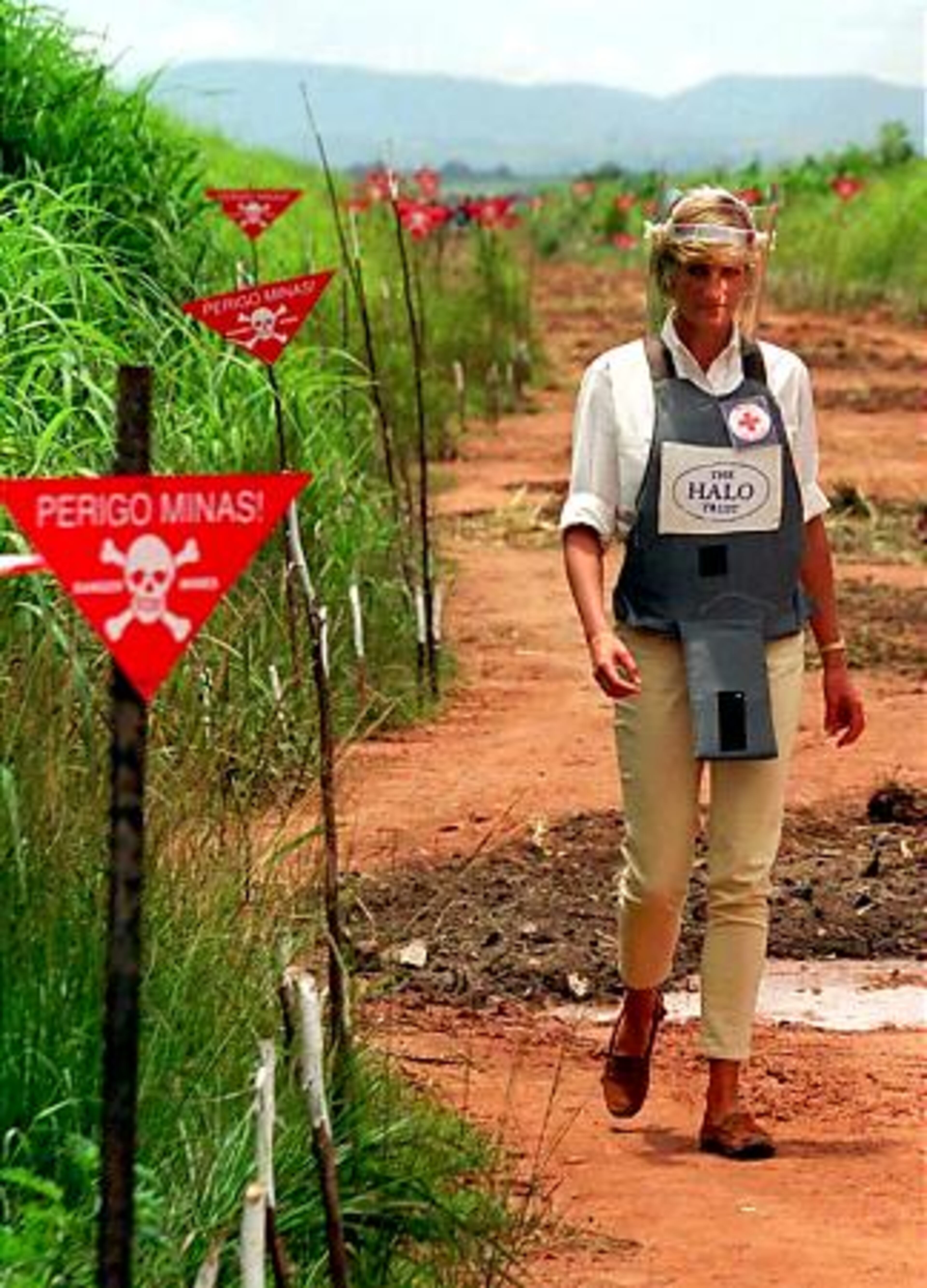 Diana was part of a worldwide campaign to clear landmines from wartorn areas. She tours a minefield dressed in a flak jacket and face shield in Huambo, central Angola, in January 1997.