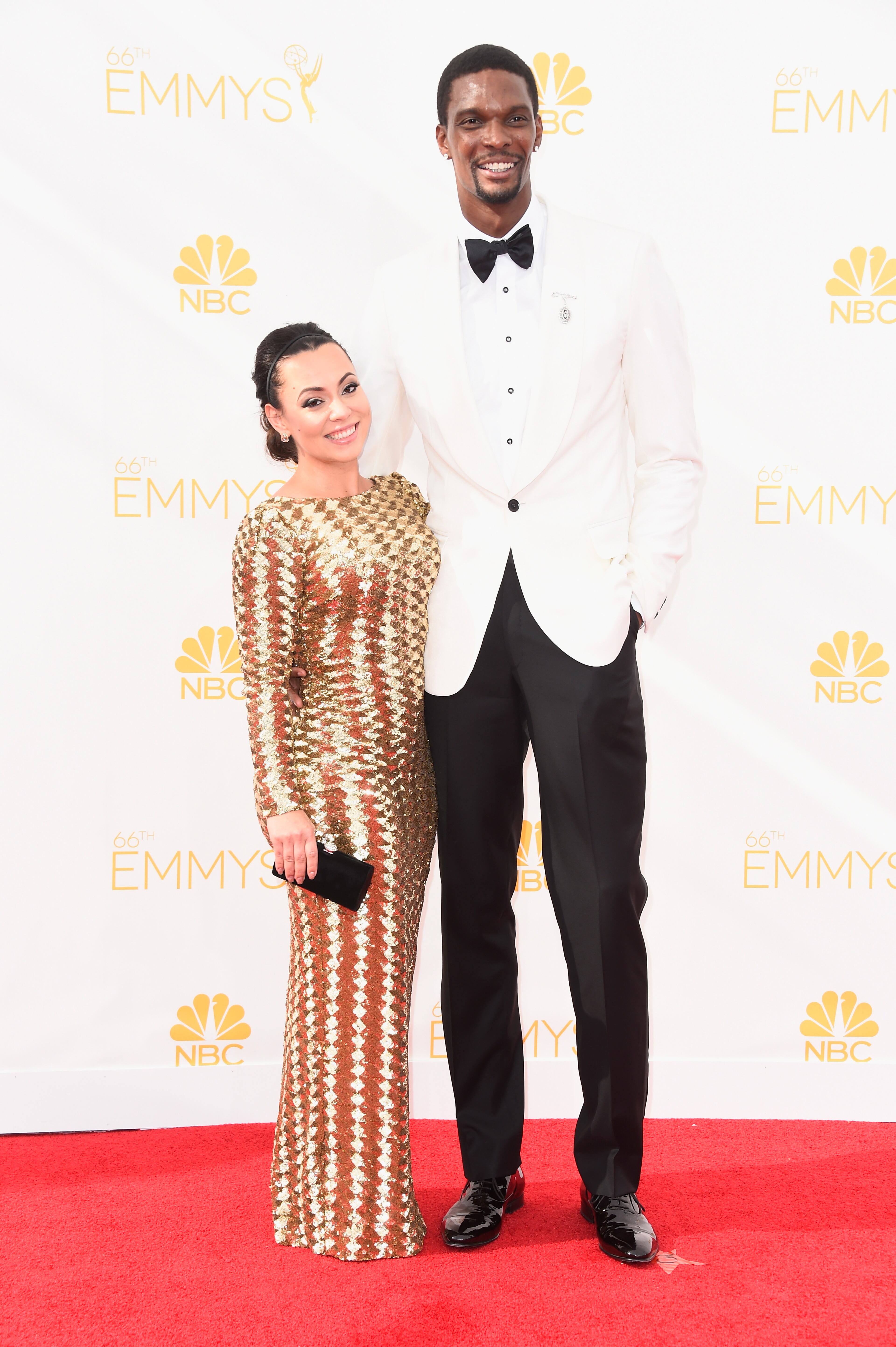 Adrienne Bosh and basketball player Chris Bosh (R) attend the 66th Annual Primetime Emmy Awards held at Nokia Theatre L.A. Live on August 25, 2014 in Los Angeles, California. (Photo by Frazer Harrison/Getty Images)